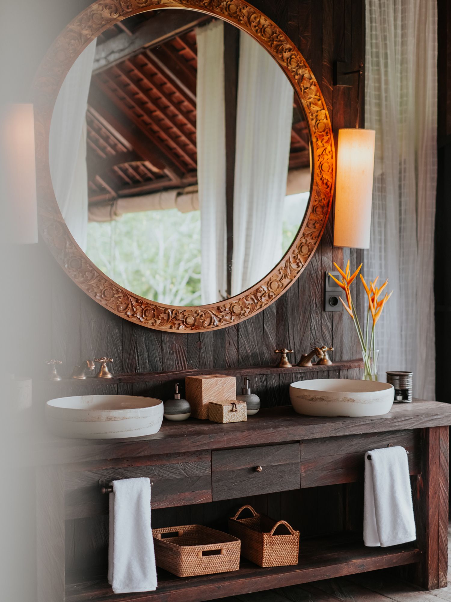 The vanity mirrors feature a hand-carved border by a local Balinese carpenter Image: Courtesy of Banyan Tree Holdings