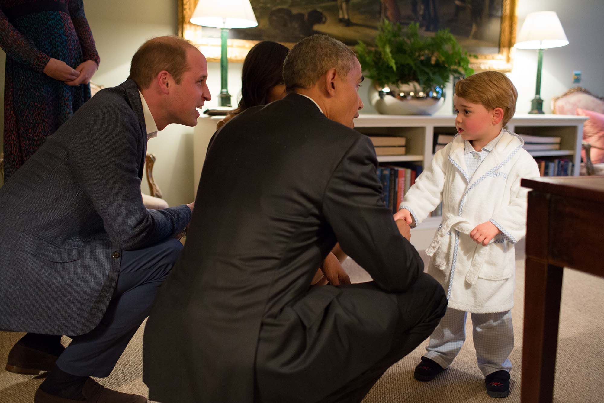 In this iconic photo, President Barack Obama meets Prince George at Kensington Palace while the prince was in his pyjamas. He certainly did not look very pleased at being disturbed from his rest. (Photo: Getty Image)