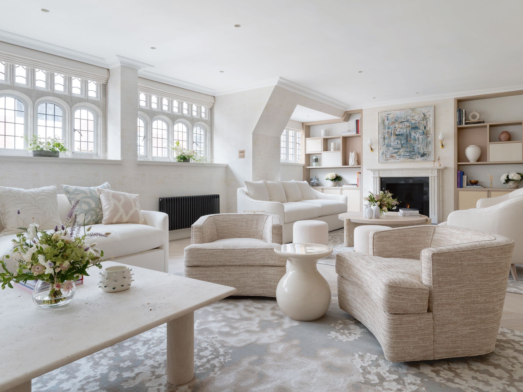 An all-white interior, such as this living room designed by Rebecca James, can help keep temperatures cool Photo: Rich Gooding