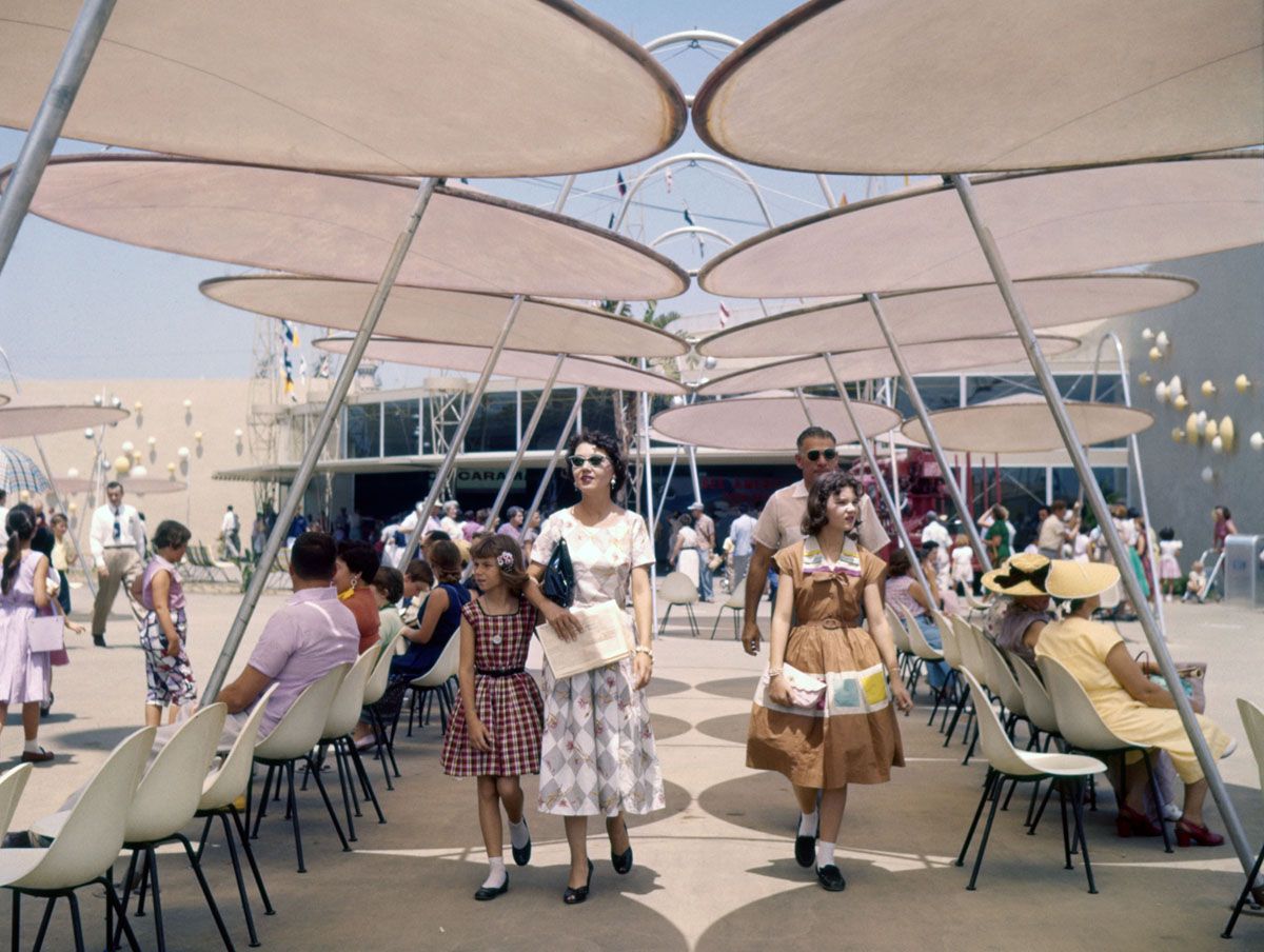 July 17, 1955: People resting in Tomorrowland's 'Space Port' in Disneyland Amusement Park, Anaheim, California. (Photo by Loomis Dean/The LIFE Picture Collection via Getty Images)