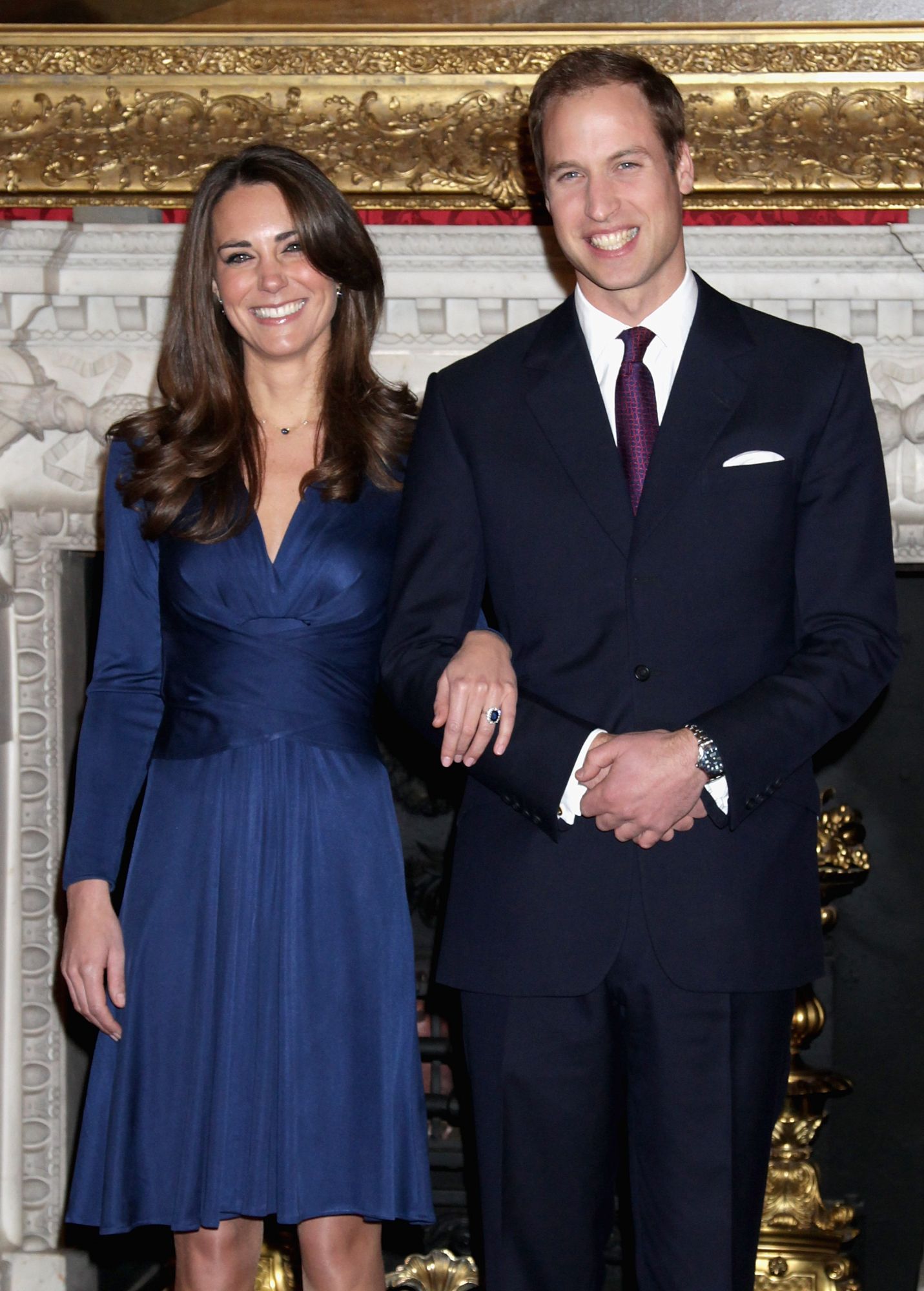 LONDON, ENGLAND - NOVEMBER 16:  Prince William and Kate Middleton pose for photographs in the State Apartments of St James Palace on November 16, 2010 in London, England. After much speculation, Clarence House today announced the engagement of Prince William to Kate Middleton. The couple will get married in either the Spring or Summer of next year and continue to live in North Wales while Prince William works as an air sea rescue pilot for the RAF. The couple became engaged during a recent holiday in Kenya