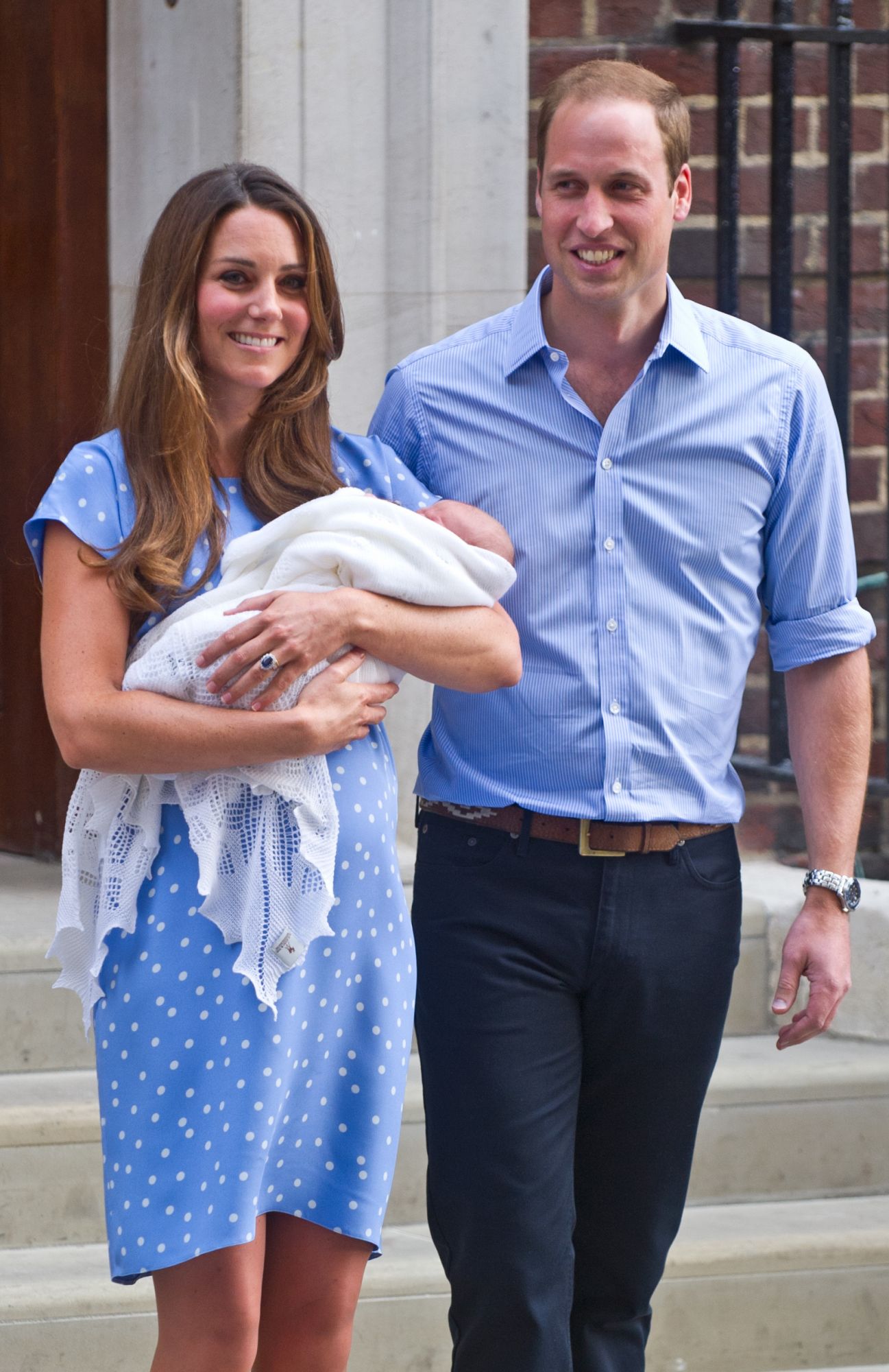Prince WIlliam, Duke of Cambridge and Catherine, Duchess of Cambridge leave St Mary's Hospital in London, UK after the birth of Prince George on July 23, 2013. (Photo by Zak Hussein/Corbis via Getty Images)