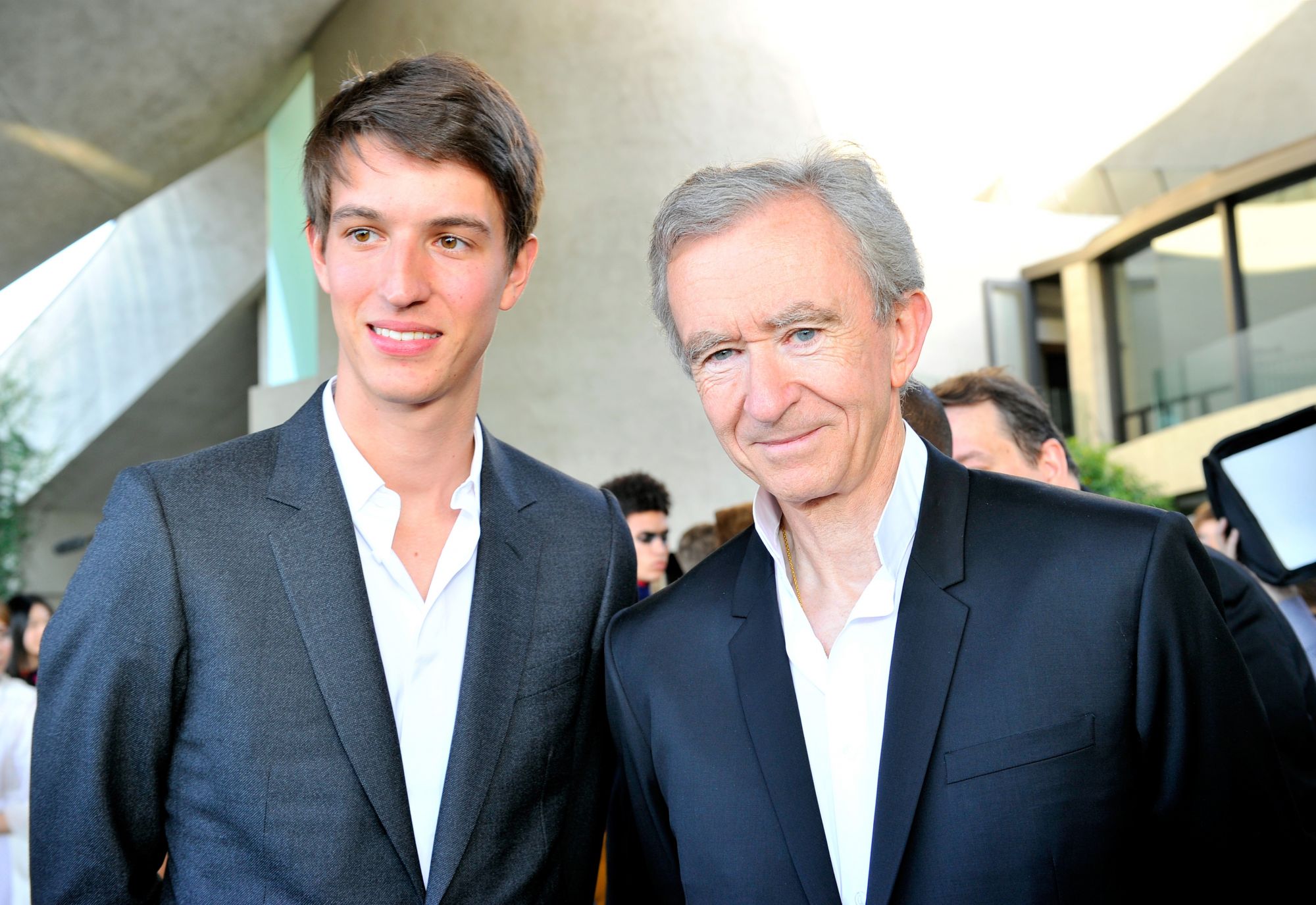 PALM SPRINGS, CA - MAY 06: Alexandre Arnault (L) and Chairman and Chief Executive Officer Bernard Arnault attend the Louis Vuitton Cruise 2016 Resort Collection shown at a private residence on May 6, 2015 in Palm Springs, California. (Photo by Donato Sardella/Getty Images for Louis Vuitton)