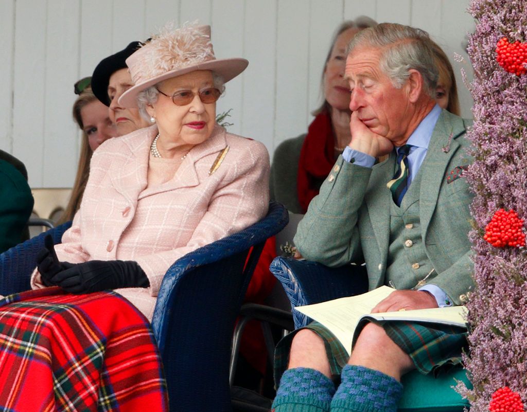 BRAEMAR, SCOTLAND - SEPTEMBER 07: (EMBARGOED FOR PUBLICATION IN UK NEWSPAPERS UNTIL 48 HOURS AFTER CREATE DATE AND TIME) Queen Elizabeth II and Prince Charles, Prince of Wales attend the annual Braemar Highland Games at The Princess Royal and Duke of Fife Memorial Park on September 7, 2013 in Braemar, Scotland. (Photo by Max Mumby/Indigo/Getty Images)