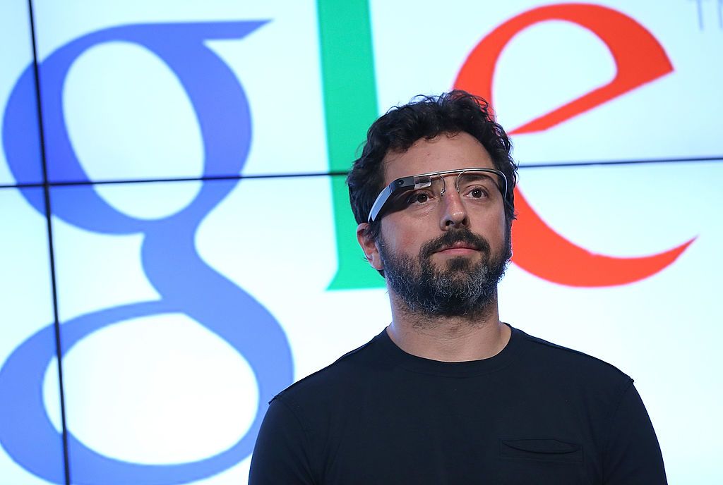 MOUNTAIN VIEW, CA - SEPTEMBER 25: Google co-founder Sergey Brin looks on during a news conference at Google headquarters on September 25, 2012 in Mountain View, California. California Gov. Jerry Brown signed State Senate Bill 1298 that allows driverless cars to operate on public roads for testing purposes. The bill also calls for the Department of Motor Vehicles to adopt regulations that govern licensing, bonding, testing and operation of the driverless vehicles before January 2015. (Photo by Justin Sull
