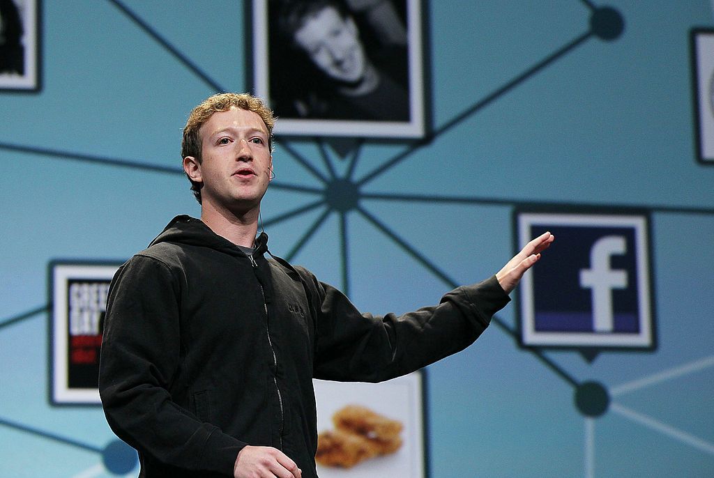 SAN FRANCISCO - APRIL 21: Facebook founder and CEO Mark Zuckerberg delivers the opening keynote address at the f8 Developer Conference April 21, 2010 in San Francisco, California. Zuckerberg kicked off the the one day conference for developers that features breakout sessions on the future of social technologies. (Photo by Justin Sullivan/Getty Images)