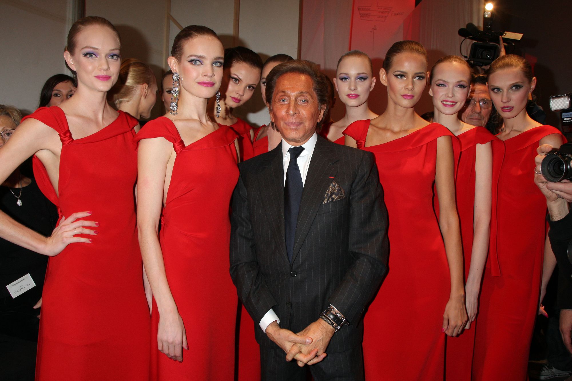 PARIS - JANUARY 23: Valentino and Natalia Vodianova walk with models on the catwalk for final at the Valentino Fashion show, during Paris Fashion Week (Haute Couture) Spring-Summer 2008 on January 23, 2008 at Musee Rodin in Paris, France. (Photo by Michel Dufour/WireImage)