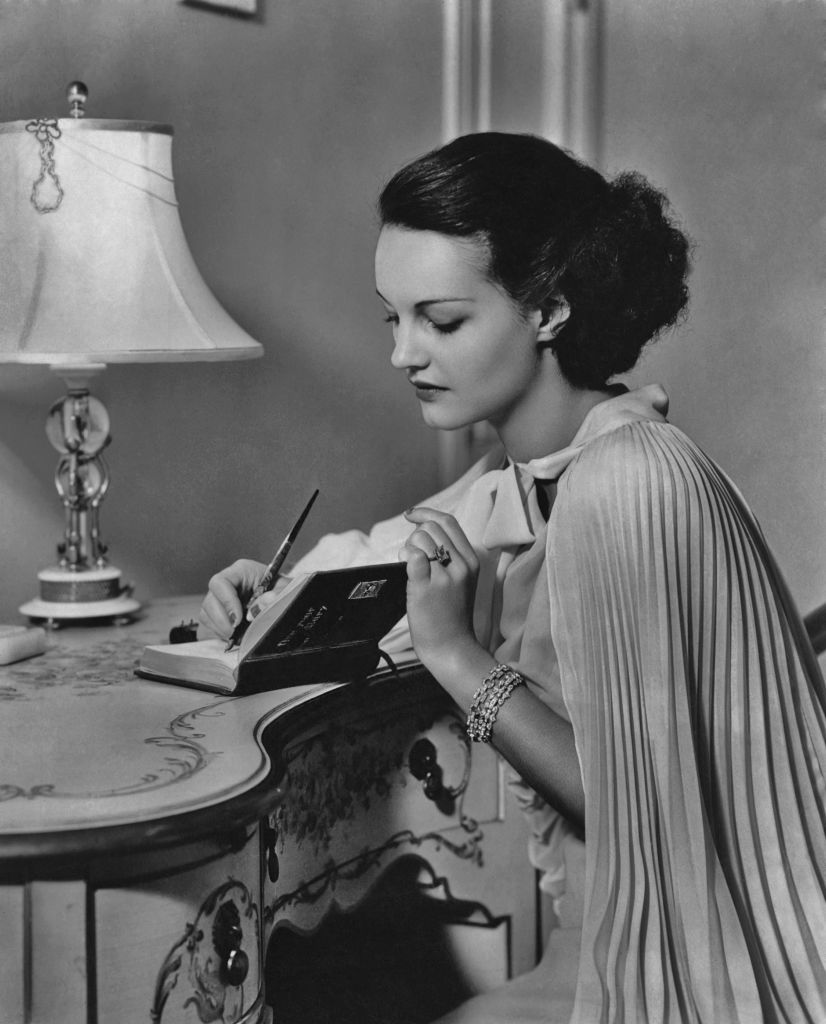 American actress Rochelle Hudson (1916 - 1972) writes in her diary in the 1930's. (Photo by Keystone View/FPG/Getty Images)