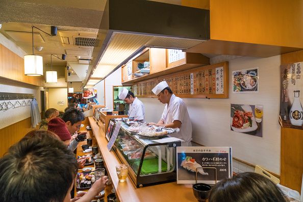 Sushi restaurant. Tsukiji Central Fish Market. Tokyo. Japan. (Photo by: Peter Adams/Avalon/Universal Images Group via Getty Images)