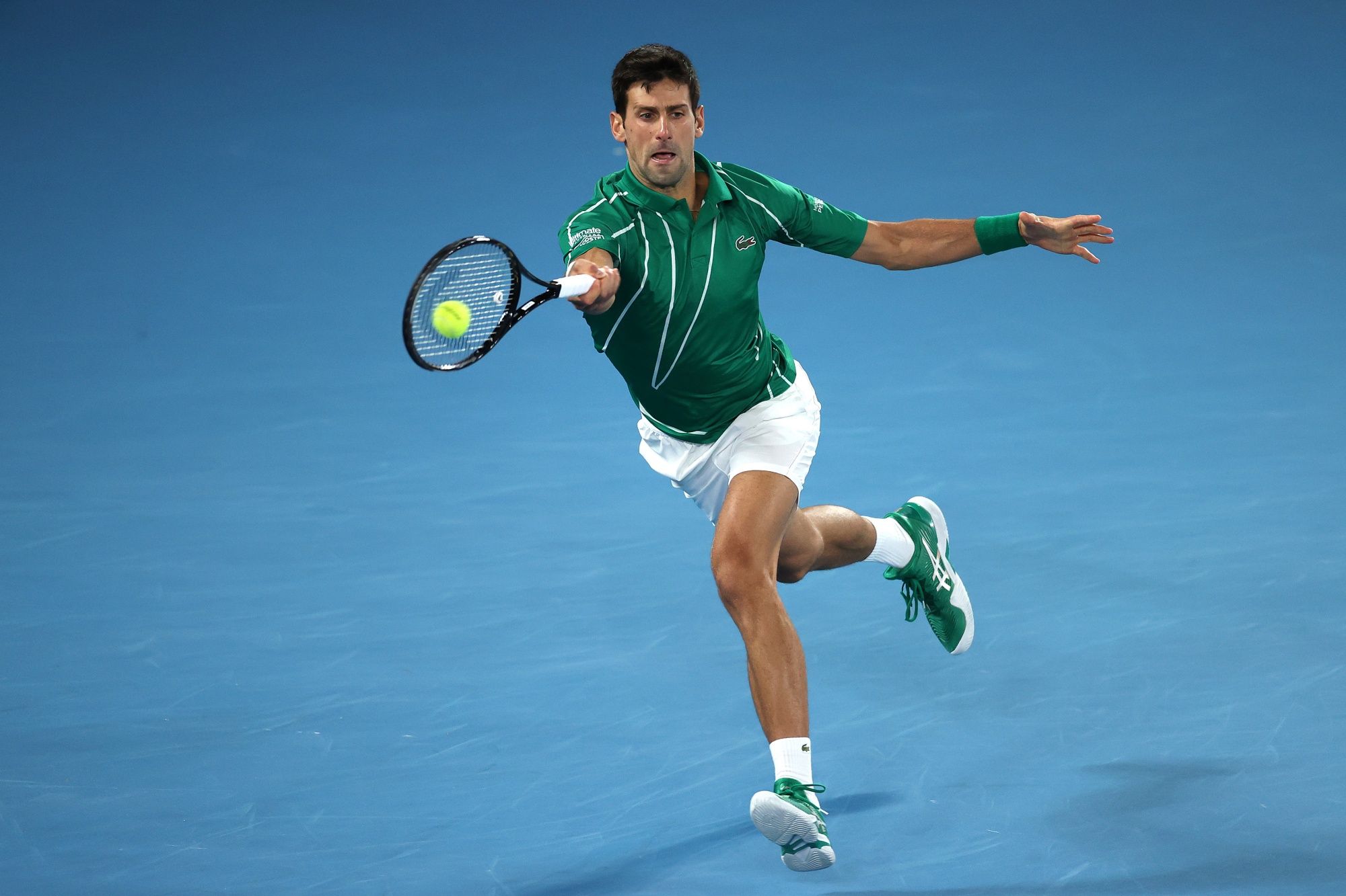 MELBOURNE, AUSTRALIA - FEBRUARY 02: Novak Djokovic of Serbia plays a forehand during his Men's Singles Final match against Dominic Thiem of Austria on day fourteen of the 2020 Australian Open at Melbourne Park on February 02, 2020 in Melbourne, Australia. (Photo by Graham Denholm/Getty Images)
