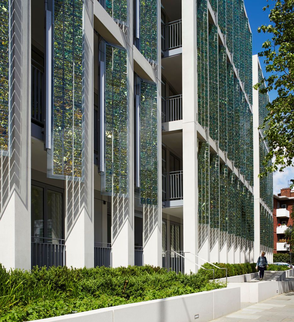 Kingsgate House, London, United Kingdom. Architect: Horden Cherry Lee Architects Ltd, 2014. Perspective along facade with colonnade and solar panels. (Photo by: Dennis Gilbert/View Pictures/Universal Images Group via Getty Images)