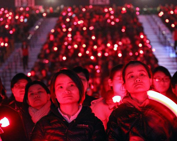 Fans of late Cantopop diva Anita Mui Yim-fong attend her memorial concert in Hong Kong Convention and Exhibition Centre, Wan Chai. 30DEC13 (Photo by Felix Wong/South China Morning Post via Getty Images)