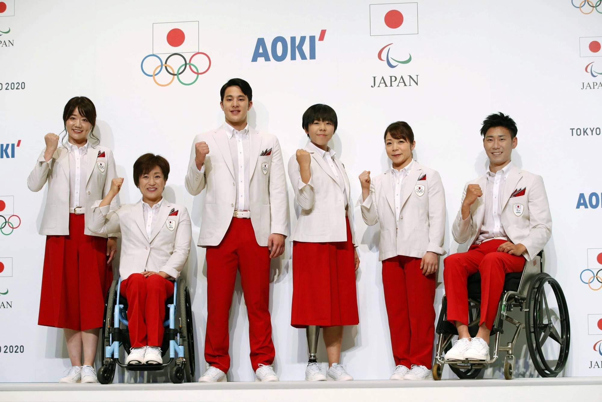 Athletes pose with official uniforms for the Tokyo Olympic and Paralympic opening ceremonies during its unveiling event in Tokyo, Japan in this photo taken by Kyodo January 23, 2020. Mandatory credit Kyodo/via REUTERS ATTENTION EDITORS - THIS IMAGE WAS PROVIDED BY A THIRD PARTY. MANDATORY CREDIT. JAPAN OUT. NO COMMERCIAL OR EDITORIAL SALES IN