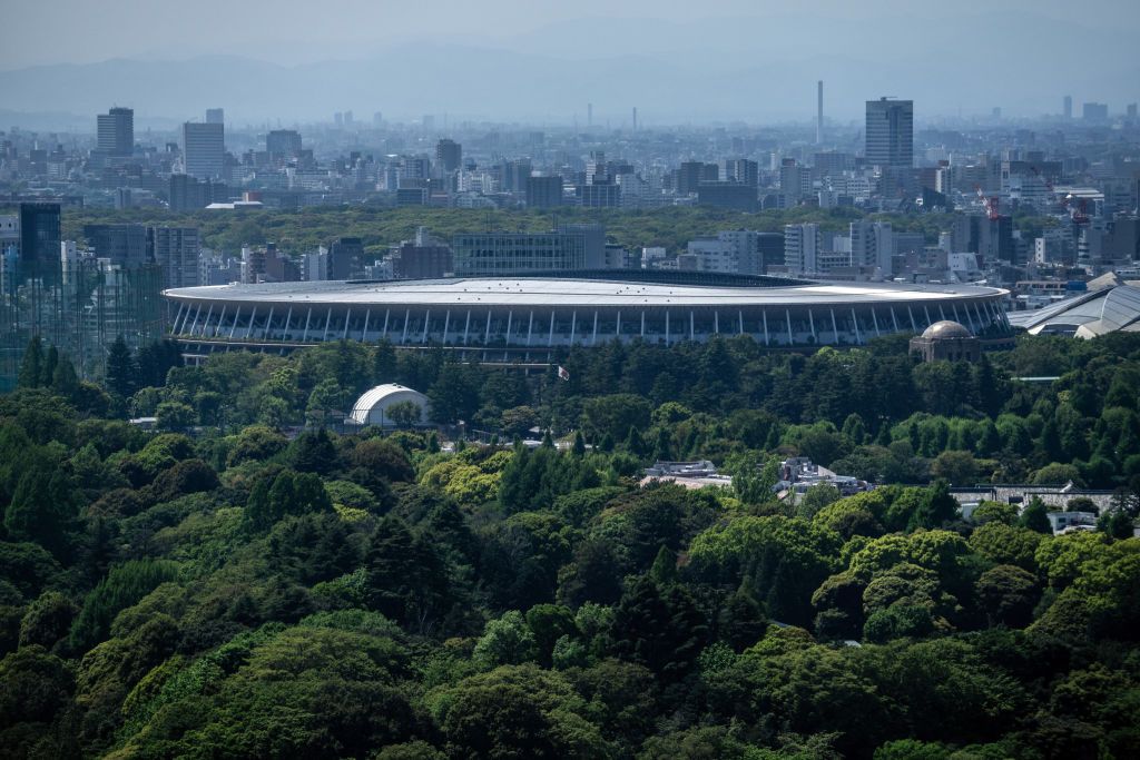 TOKYO, JAPAN - APRIL 21: The New National Stadium, the main stadium for the Tokyo Olympics, is pictured on April 21, 2021 in Tokyo, Japan. The Japanese government is expected to impose a third state of emergency in Tokyo soon amid an increase in cases of Covid-19 coronavirus in what experts have said is the fourth wave of the virus to hit the country. Prime Minister Yoshihide Suga has stated that any declaration would not affect the hosting of the Olympics which are now only three months away. (Photo by Car