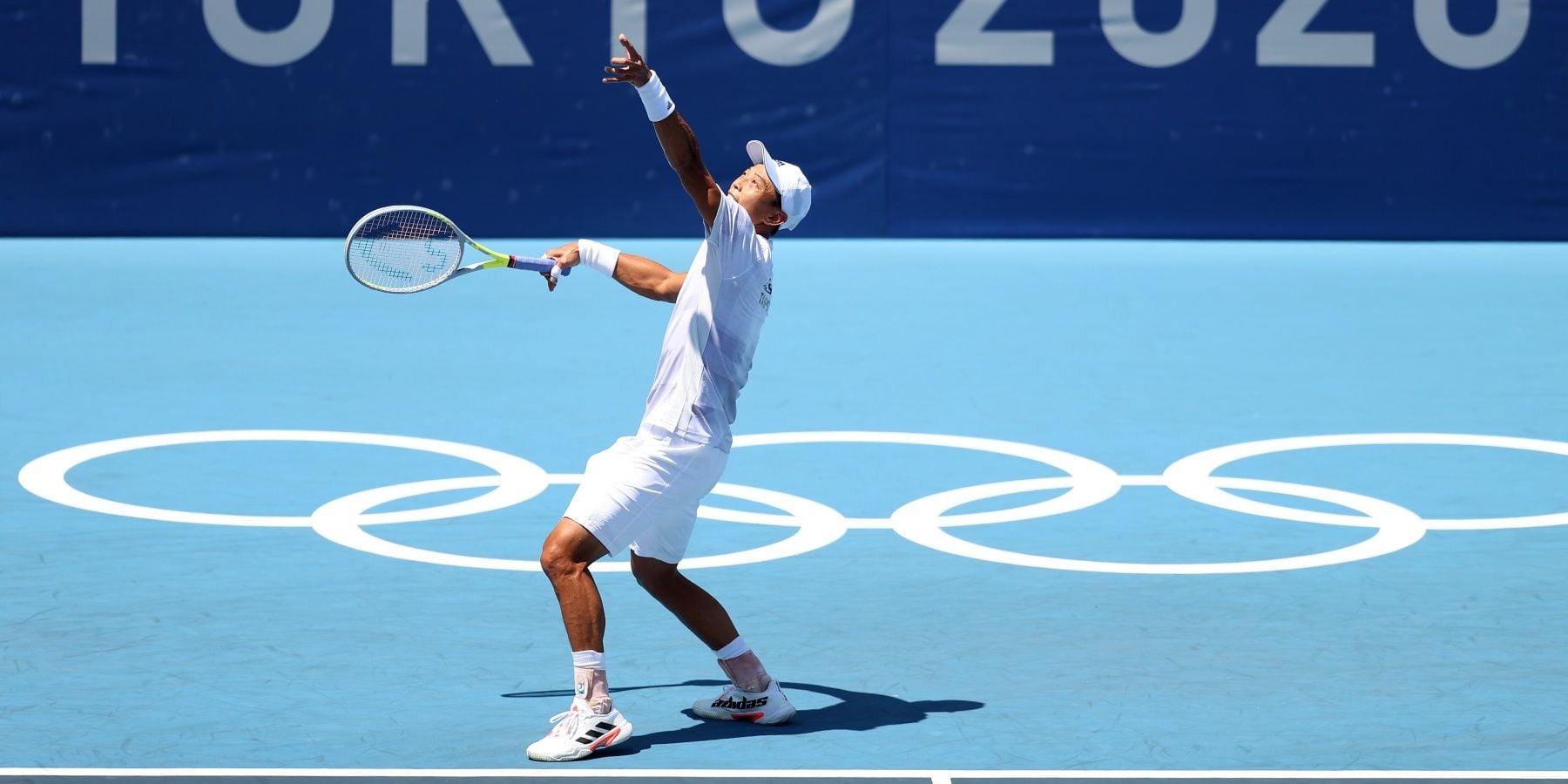 TOKYO, JAPAN - JULY 25: Yen-Hsun Lu of Team Chinese Taipei serves during his Men's Singles First Round match against Alexander Zverev of Team Germany on day two of the Tokyo 2020 Olympic Games at Ariake Tennis Park on July 25, 2021 in Tokyo, Japan. (Photo by Patrick Smith/Getty Images)