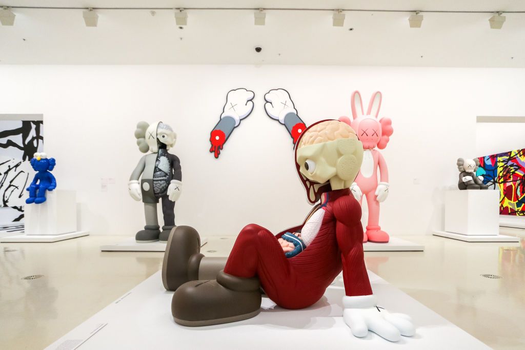 MELBOURNE, AUSTRALIA - SEPTEMBER 19: Sculptures and paintings by KAWS on display during a media preview of KAWS: Companionship in the Age of Loneliness Exhibition Opening at National Gallery of Victoria at National Gallery of Victoria on September 19, 2019 in Melbourne, Australia. (Photo by Asanka Ratnayake/Getty Images)