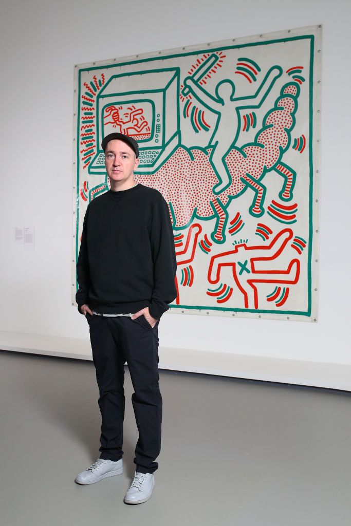 MELBOURNE, AUSTRALIA - NOVEMBER 29: Brian Donnelly aka KAWS  attends the Keith Haring | Jean Michel-Basquiat: Crossing Lines Exhibition Preview at National Gallery of Victoria on November 29, 2019 in Melbourne, Australia. The exhibition is exclusive to Melbourne and opens to the public on 1 December - World AIDS Day - on show until 13 April 2020. (Photo by Graham Denholm/Getty Images for NGV)