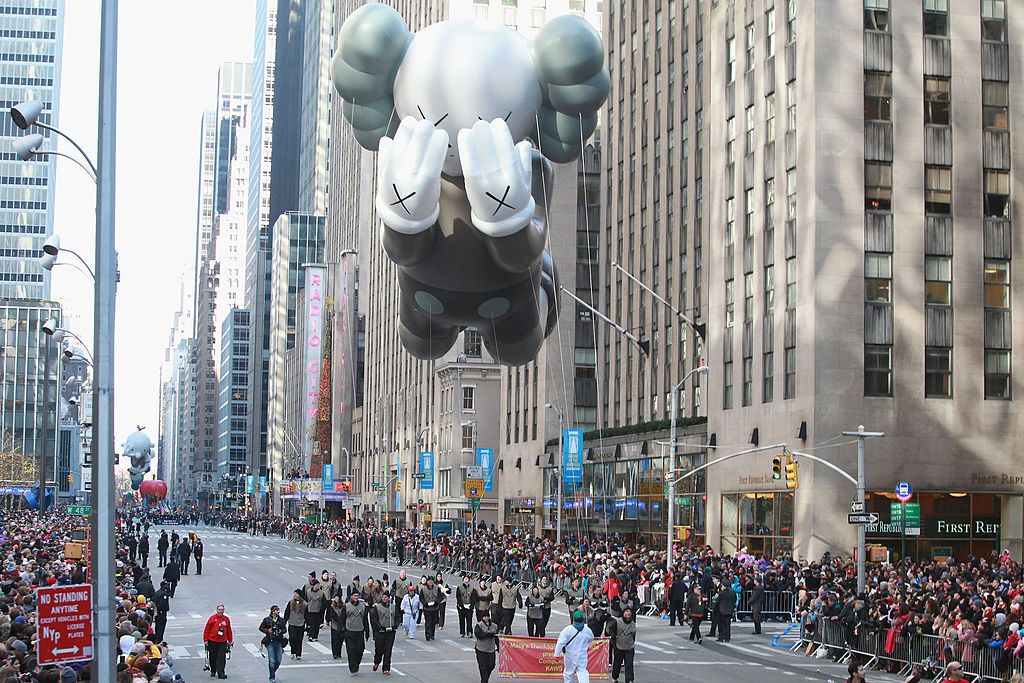 NEW YORK, NY - NOVEMBER 22:  Companion by KAWS floats in 86th Annual Macy's Thanksgiving Day Parade on November 22, 2012 in New York City.  (Photo by Taylor Hill/FilmMagic)