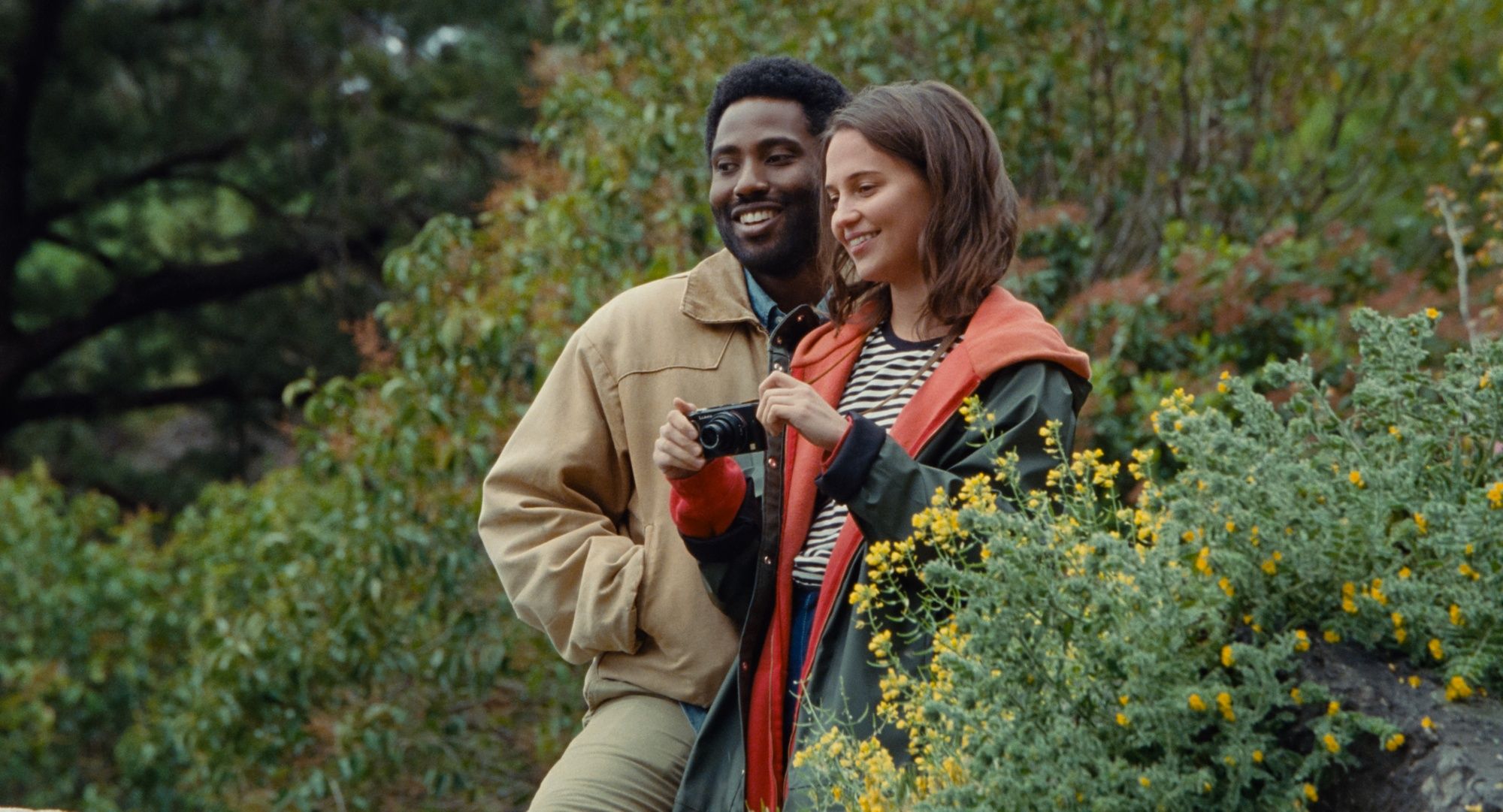 BECKETT (2021) John David Washington as Beckett and Alicia Vikander as April.  Cr: NETFLIX