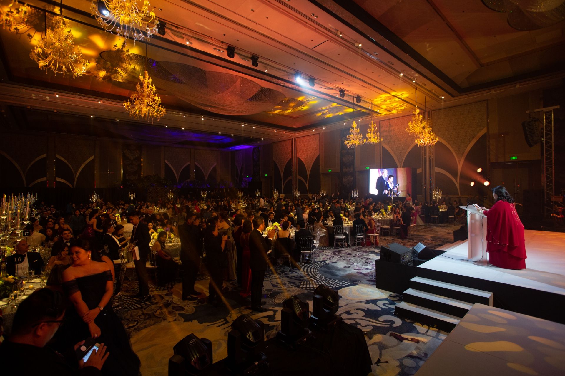 Managing Director Irene Martel Francisco welcomes the crowd