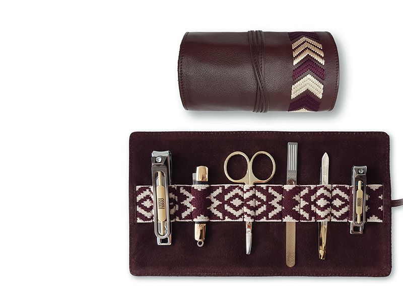 Gaucho grooming roll by Mantidy, available at <a href="https://giftslessordinary.com/gaucho-grooming-roll-in-bordeaux-red-009469" target="blank">Gifts Less Ordinary</a>