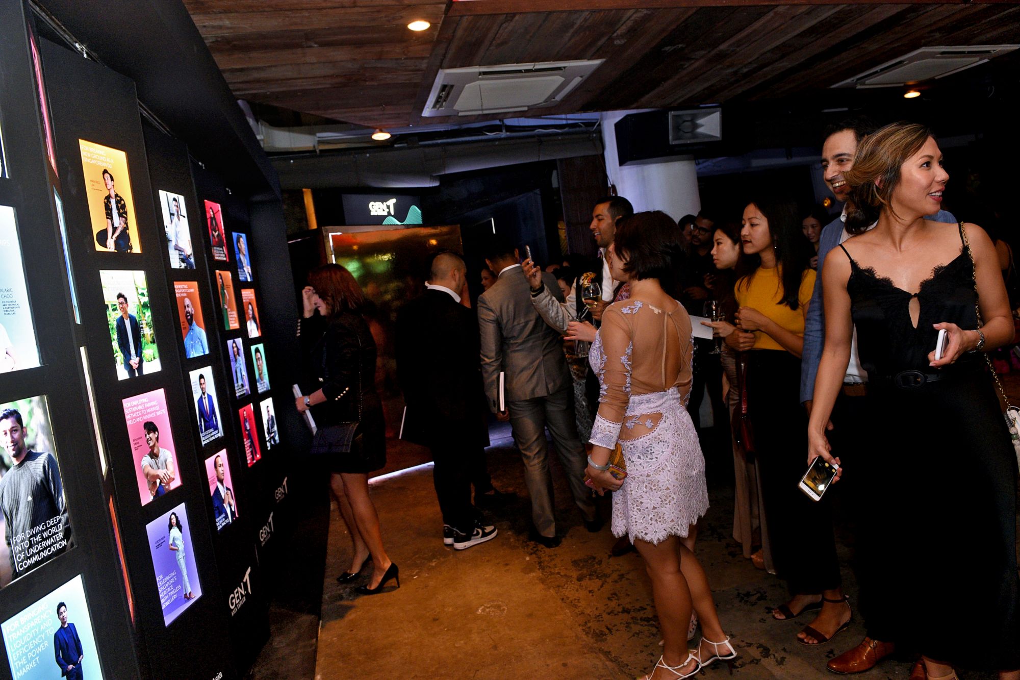 Guests looking at the physical exhibition