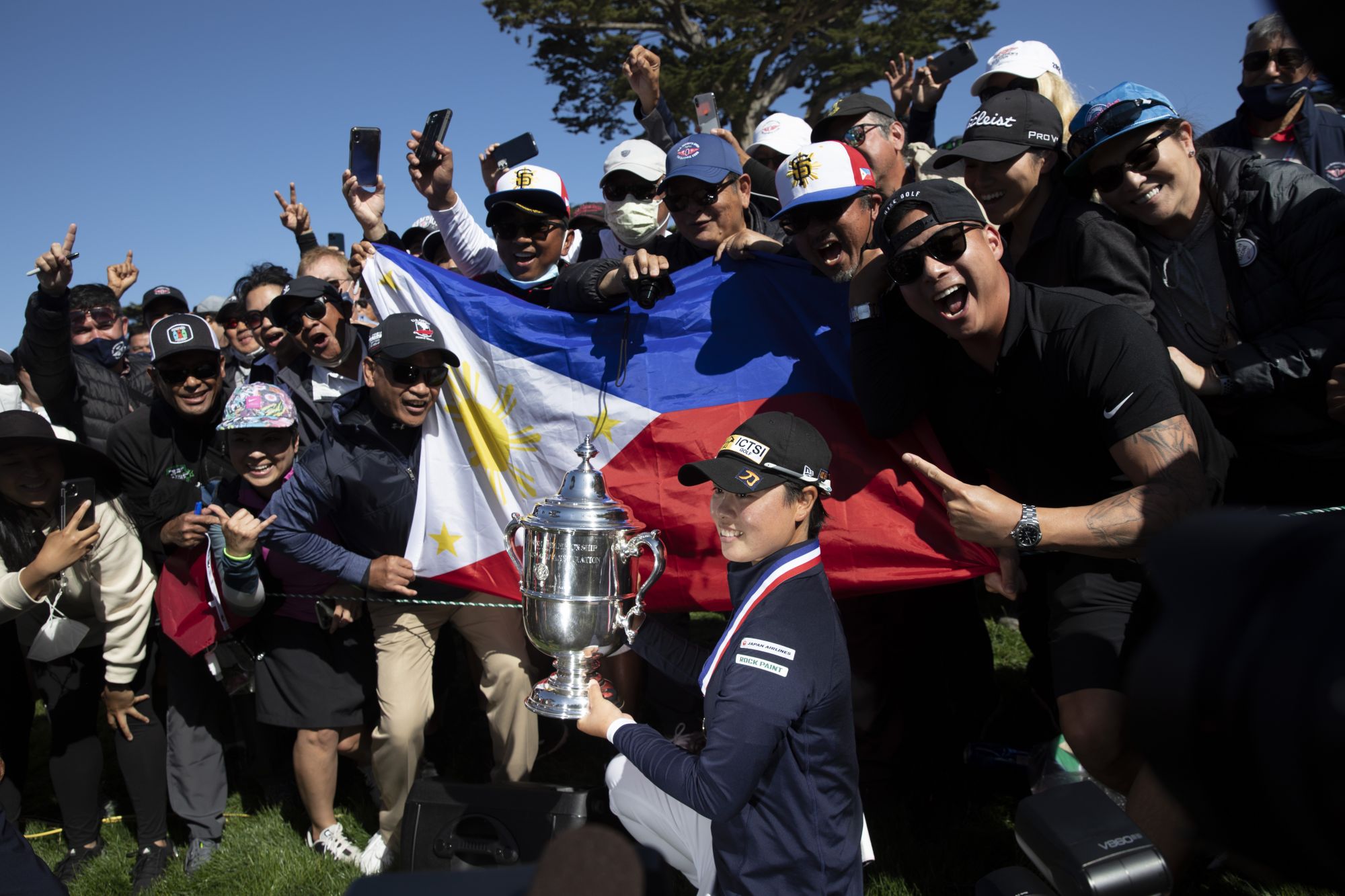 SAN FRANCISCO, CA - JUNE 06: Yuka Saso of the Philippines celebrates with the Harton S. Semple Trophy after winning the 76th U.S. Women's Open Championship held on the Lake Course at the Olympic Club in San Francisco, Calif. on Sunday, June 6, 2021. (Santiago Mejia/The San Francisco Chronicle via Getty Images) Saso won following a three-hole playoff against Nasa Hataoka of Japan.