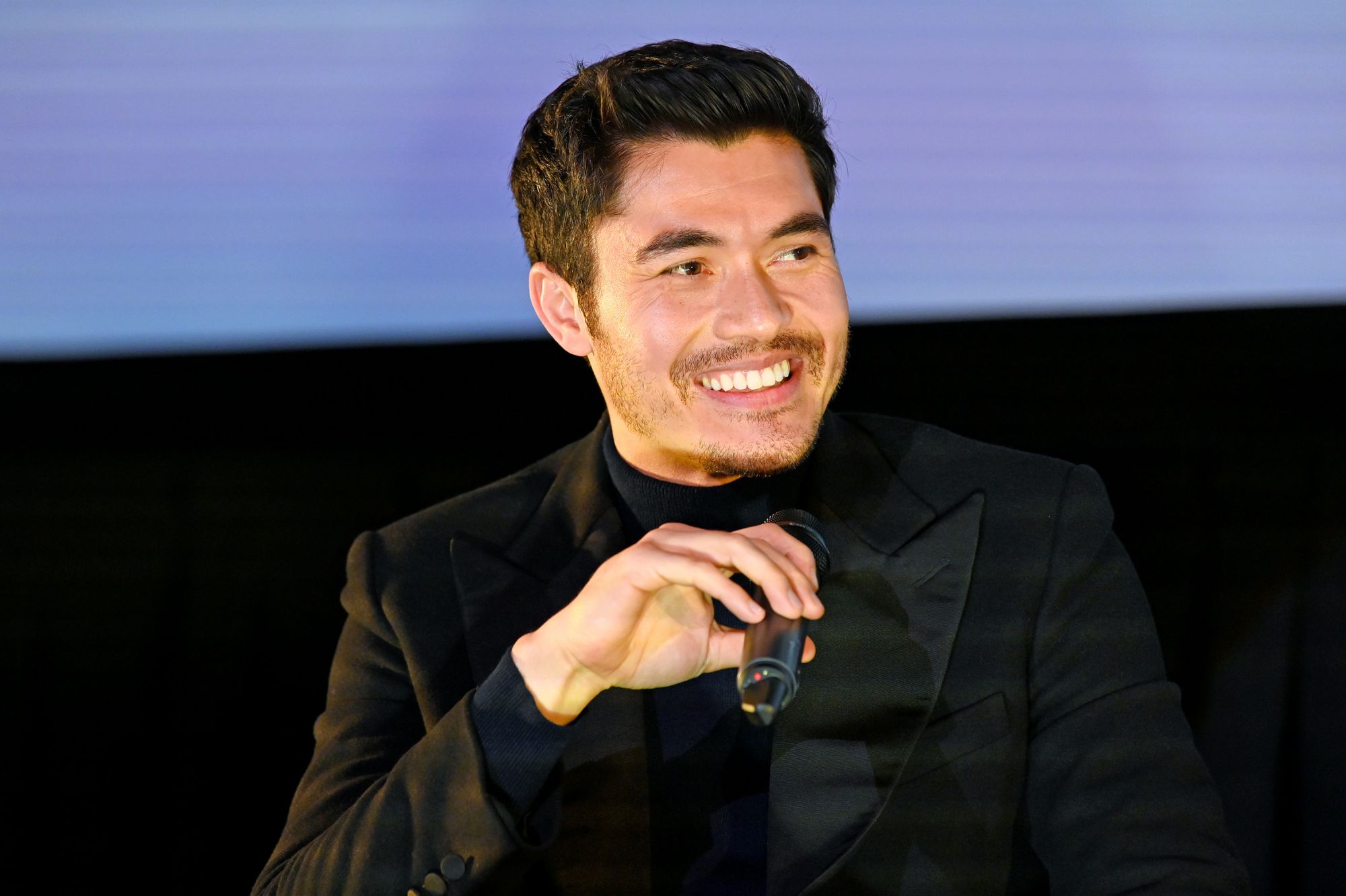NEW YORK, NEW YORK - JANUARY 11: Henry Golding speaks onstage during the Special NY Screening of "The Gentlemen" at the Alamo Drafthouse on January 11, 2020 in New York City. (Photo by Slaven Vlasic/Getty Images for STXfilms)