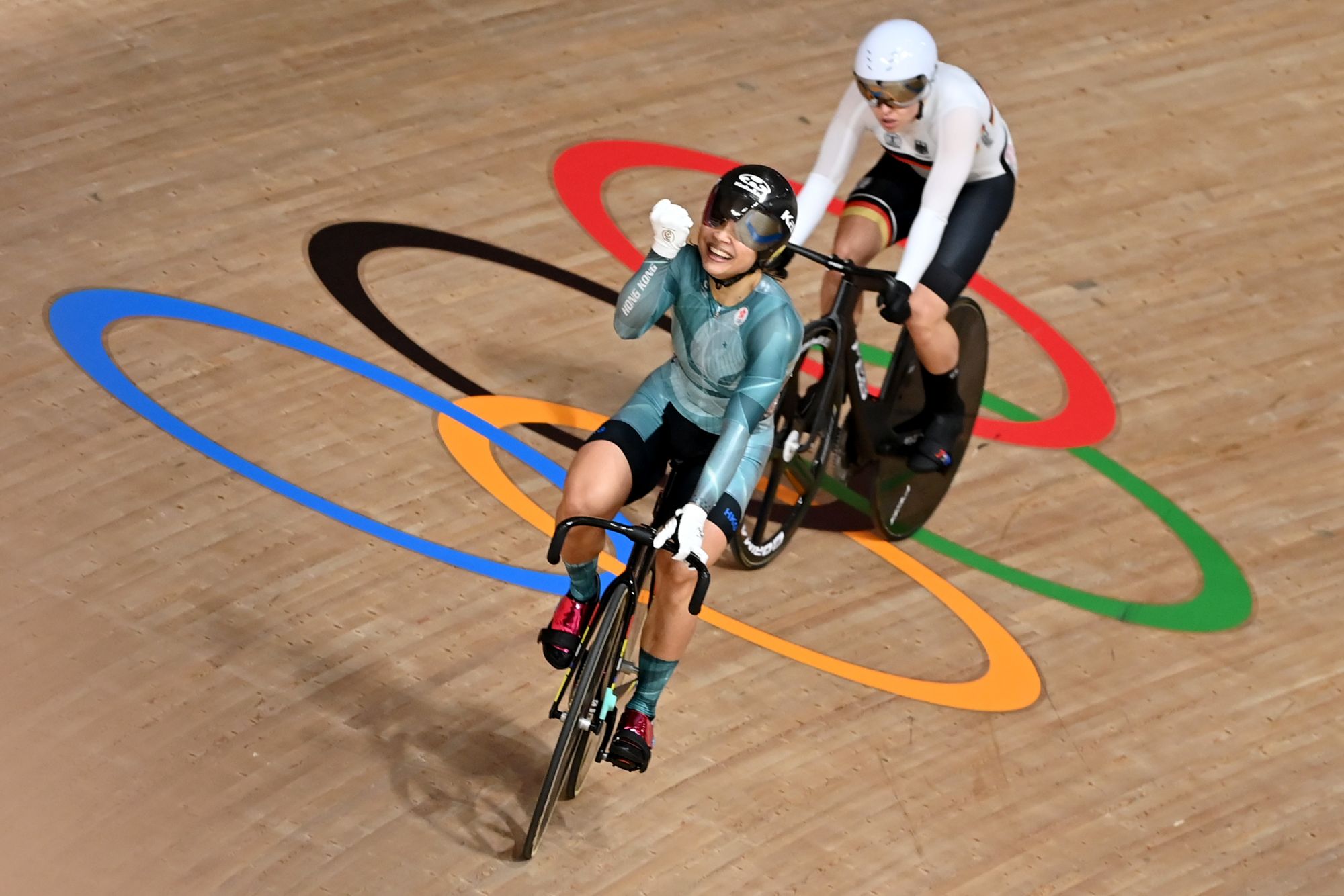 08 August 2021, Japan, Izu: Cycling/Track: Olympics, Sprint, Women, Race for Bronze at the Izu Velodrome. Emma Hinze from Germany in action behind Lee Wai-sze from Hong Kong. Photo: Sebastian Gollnow/dpa (Photo by Sebastian Gollnow/picture alliance via Getty Images)