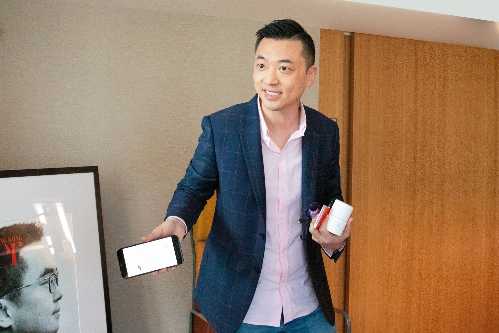 Danny Yeung shows the group Prenetics' latest product