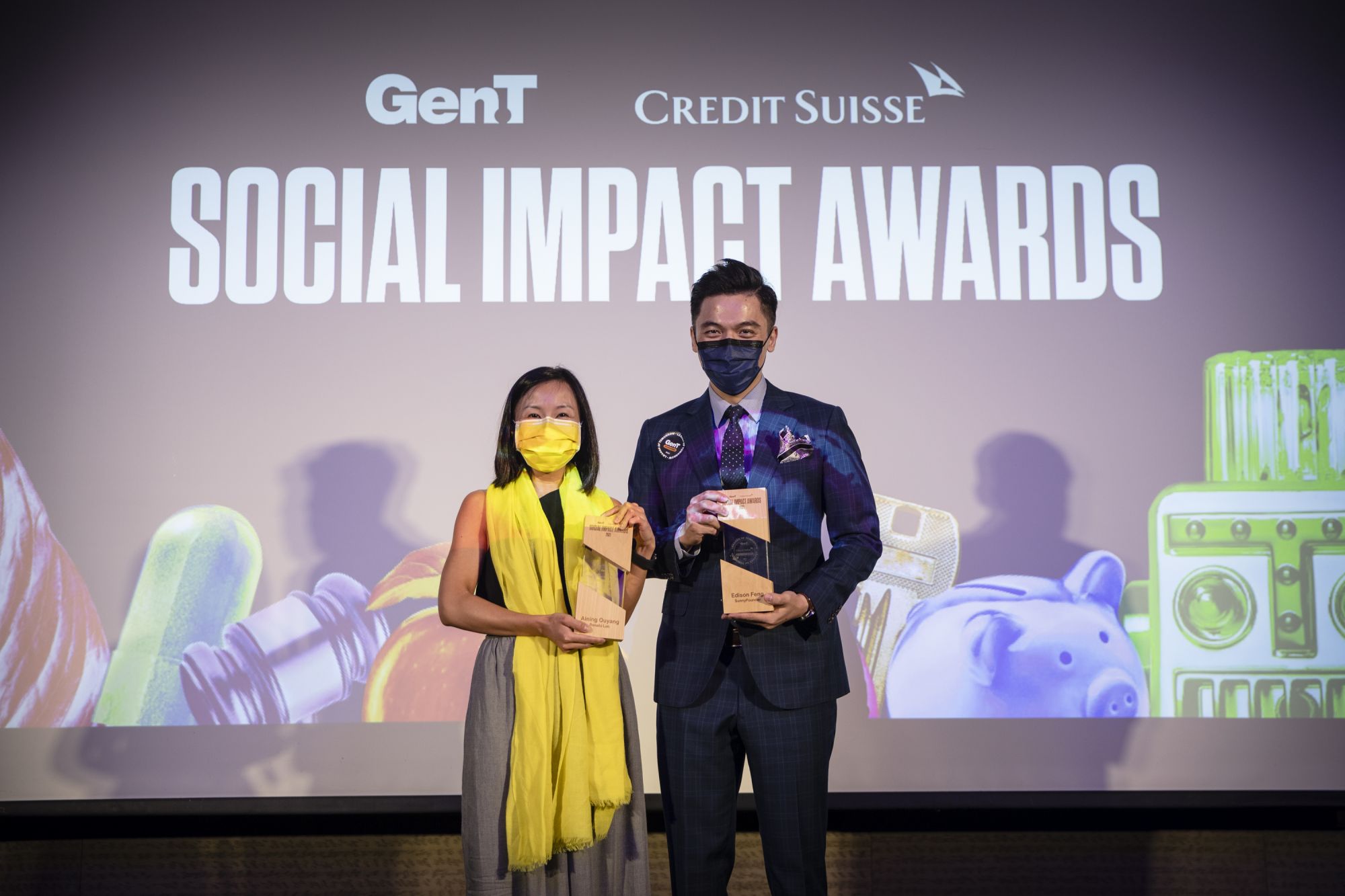 Gen.T honourees Aining Ouyang and Edison Feng accept their Social Impact Awards