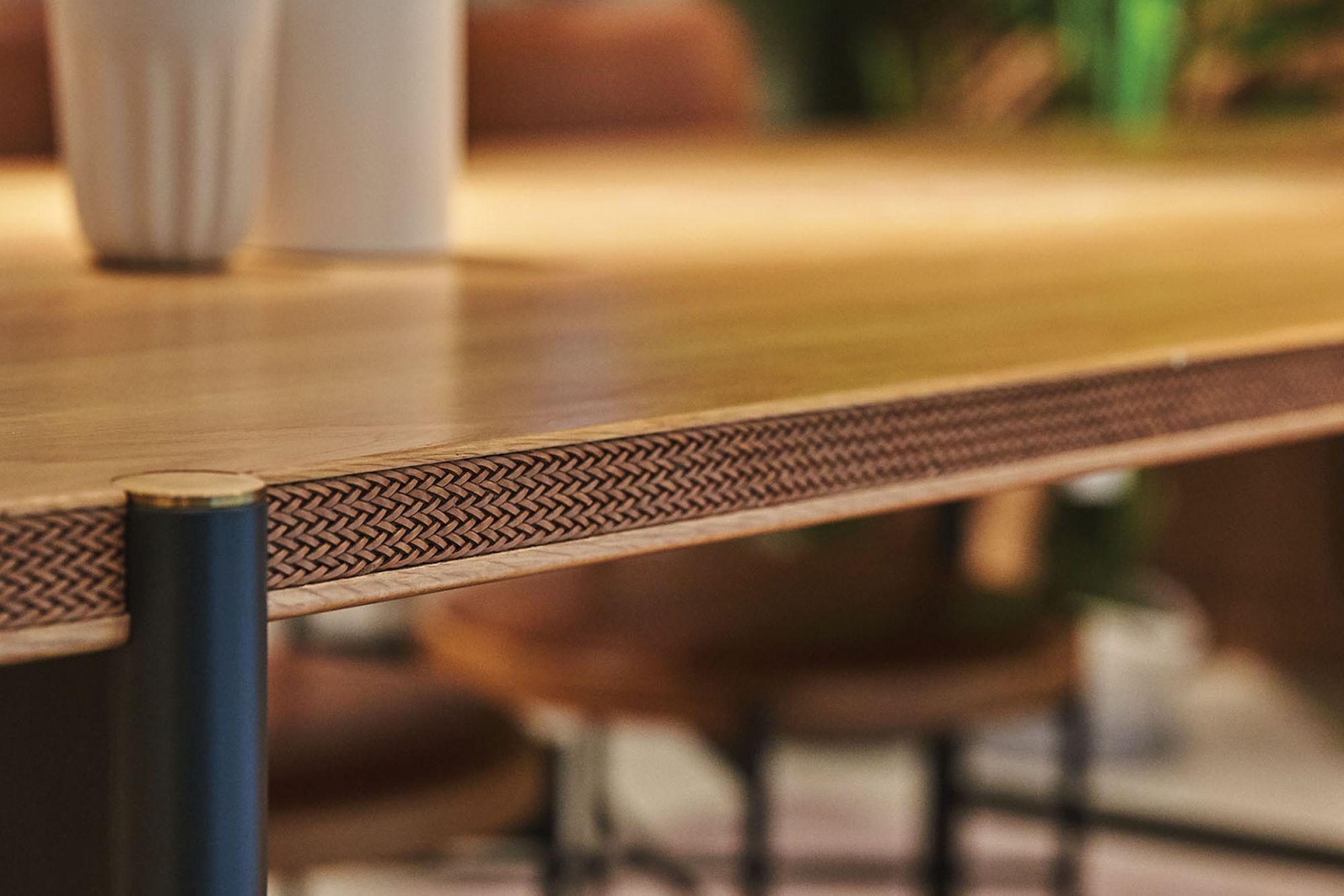 A console with braided leather detailing from the Alt.o Tierra collection