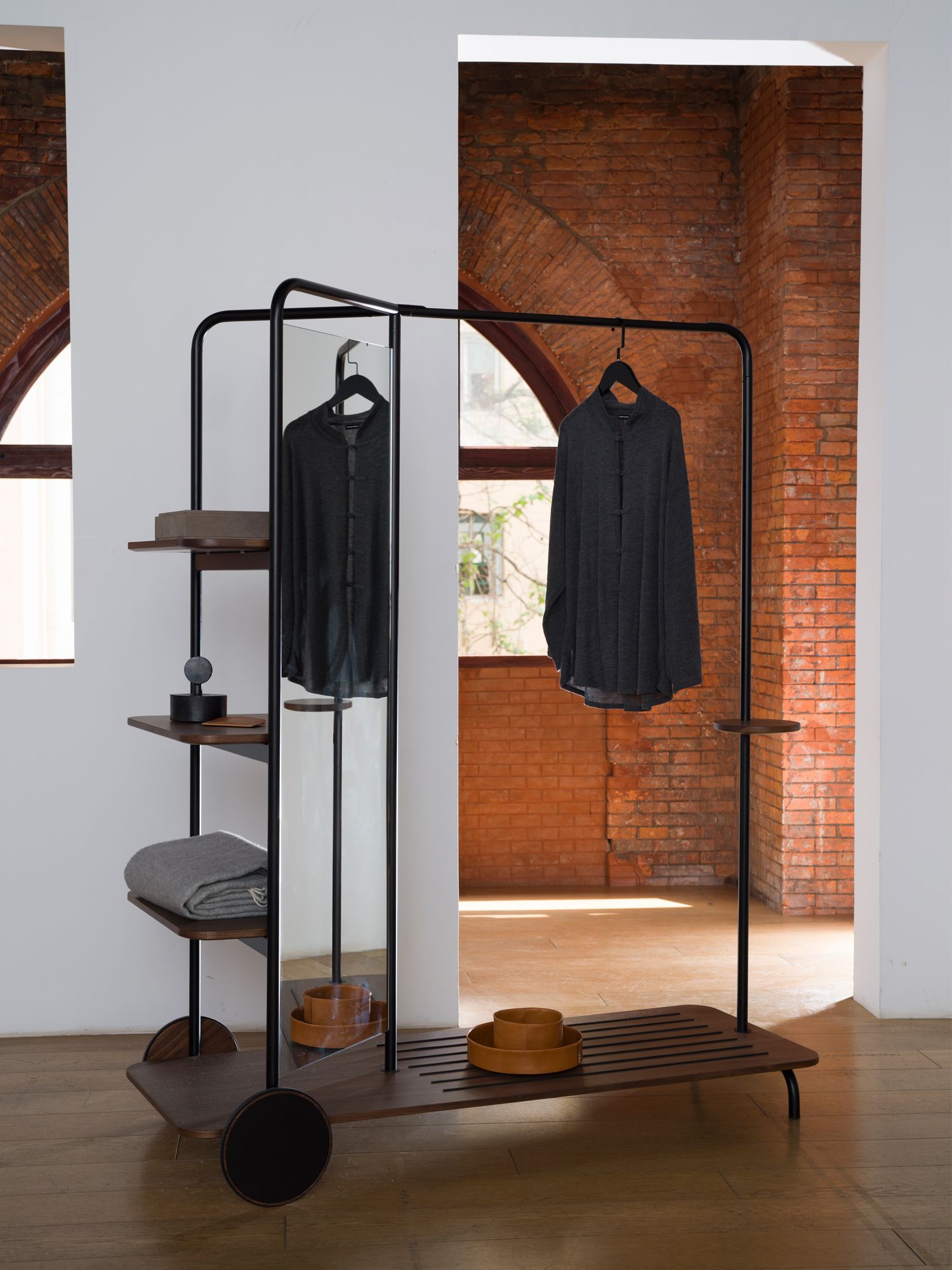 Herkner's design for the Host wardrobe offers both railing space and shelving trays Image: Courtesy of Sebastian Herkner