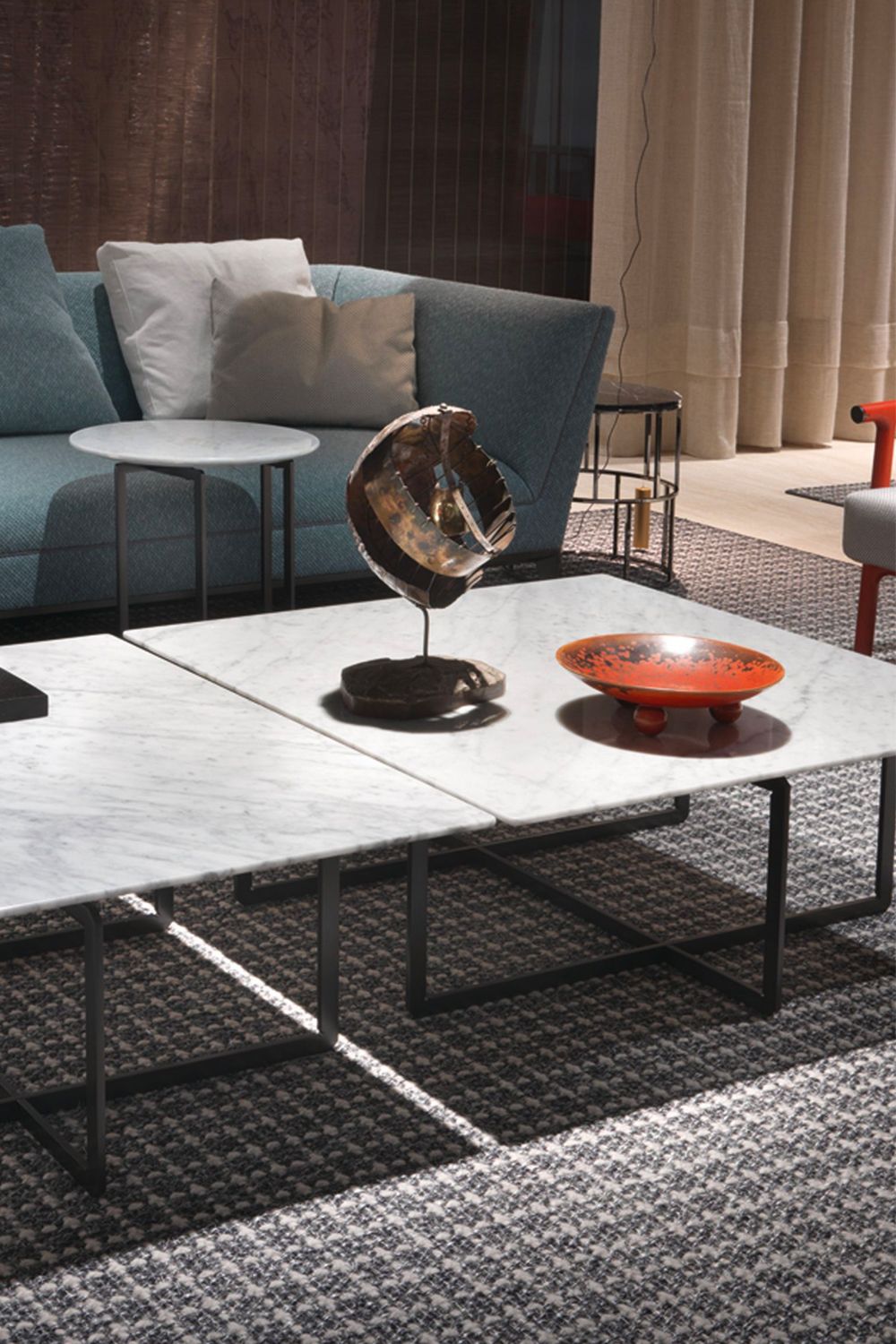 Crafted with a marble tabletop, the Marmaduke coffee table can easily be paired with other pieces Image: Courtesy of Flexform