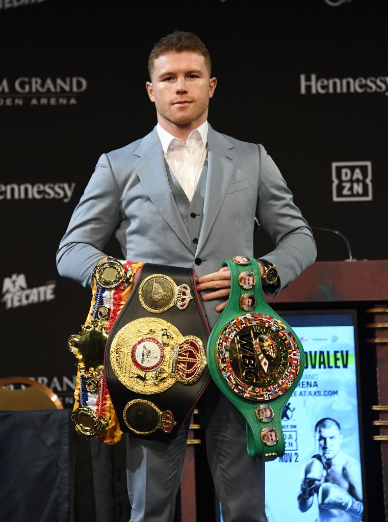 LAS VEGAS, NEVADA - OCTOBER 30: Boxer Canelo Alvarez holds his belts as he poses during a news conference at the KA Theatre at MGM Grand Hotel & Casino on October 30, 2019 in Las Vegas, Nevada. Alvarez, who is making his debut at light heavyweight, will challenge WBO light heavyweight champion Sergey Kovalev for his title at MGM Grand Garden Arena in Las Vegas on November 2. (Photo by Ethan Miller/Getty Images)