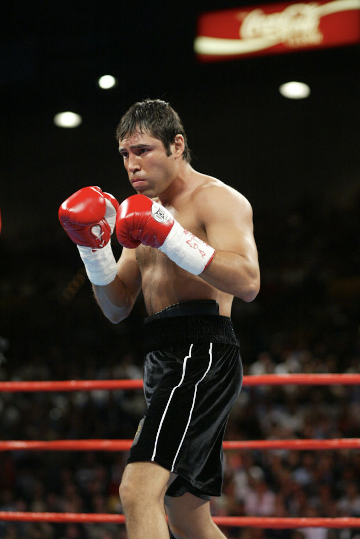 Oscar De La Hoya, pictured, fighs Shane Mosley, blue trunks, during a 12-round WBC/WBA Super Welterweight Championship bout (154lbs) held a the MGM Grand Garden Arena in Las Vegas, NV on Saturday September 13, 2003. Shane Mosely wins by unanimous decision. (Photo by Chris Polk/Getty Images)