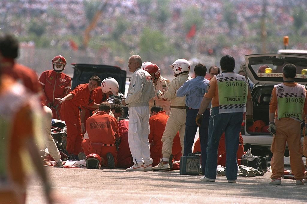 1 May 1994: The Medical team surrounds Williams Renault driver Ayrton Senna of Brazil after Senna crashes during the San Marino Grand Prix at the Imola circuit in San Marino. Senna suffered a fatal accident when the steering column apparently sheared leaving the Brazilian helpless as his car speared into the concrete wall at the Tamburello corner. Senna was officially pronounced dead in a Bologna hospital later that afternoon. \ Mandatory Credit: Anton Want/Allsport