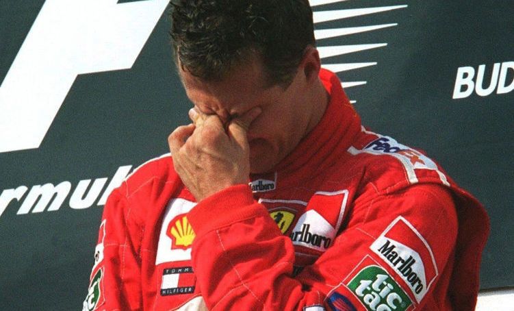 BUDAPEST, HUNGARY - AUGUST 19: GP VON UNGARN 2001, Budapest; Michael SCHUMACHER WELTMEISTER 2001; SIEGEREHRUNG: Michael SCHUMACHER/GER - FERRARI - (Photo by Andreas Rentz/Bongarts/Getty Images)