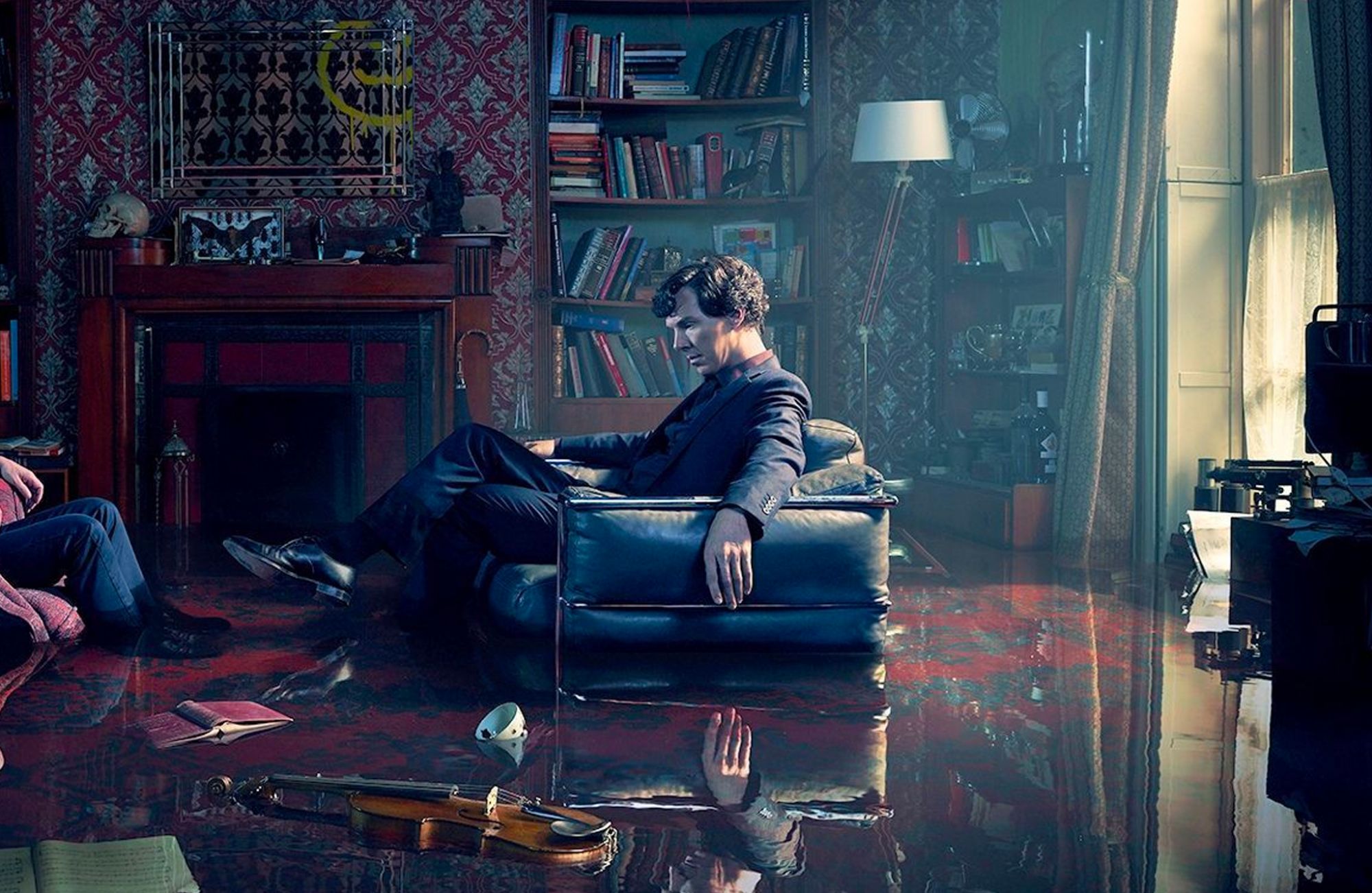 Benedict Cumberbatch's Sherlock Holmes lounges in the LC3 armchair in the BBC TV series (Image: Courtesy of BBC)