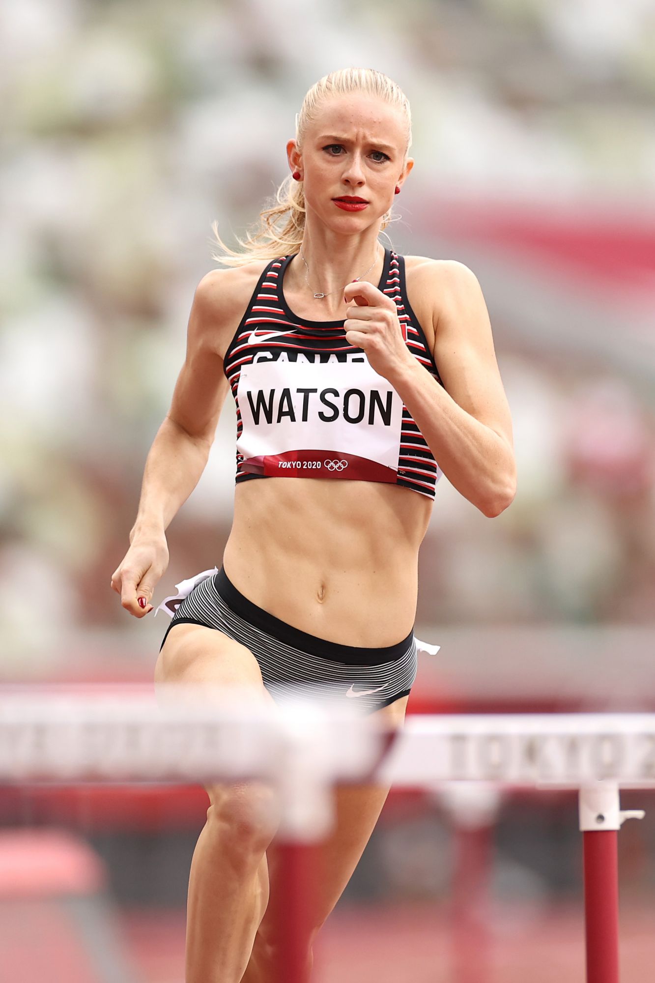 TOKYO, JAPAN - JULY 31: Sage Watson of Team Canada competes in the Women's 400m Hurdles Round 1 - Heat 1 on day eight of the Tokyo 2020 Olympic Games at Olympic Stadium on July 31, 2021 in Tokyo, Japan. (Photo by Cameron Spencer/Getty Images)