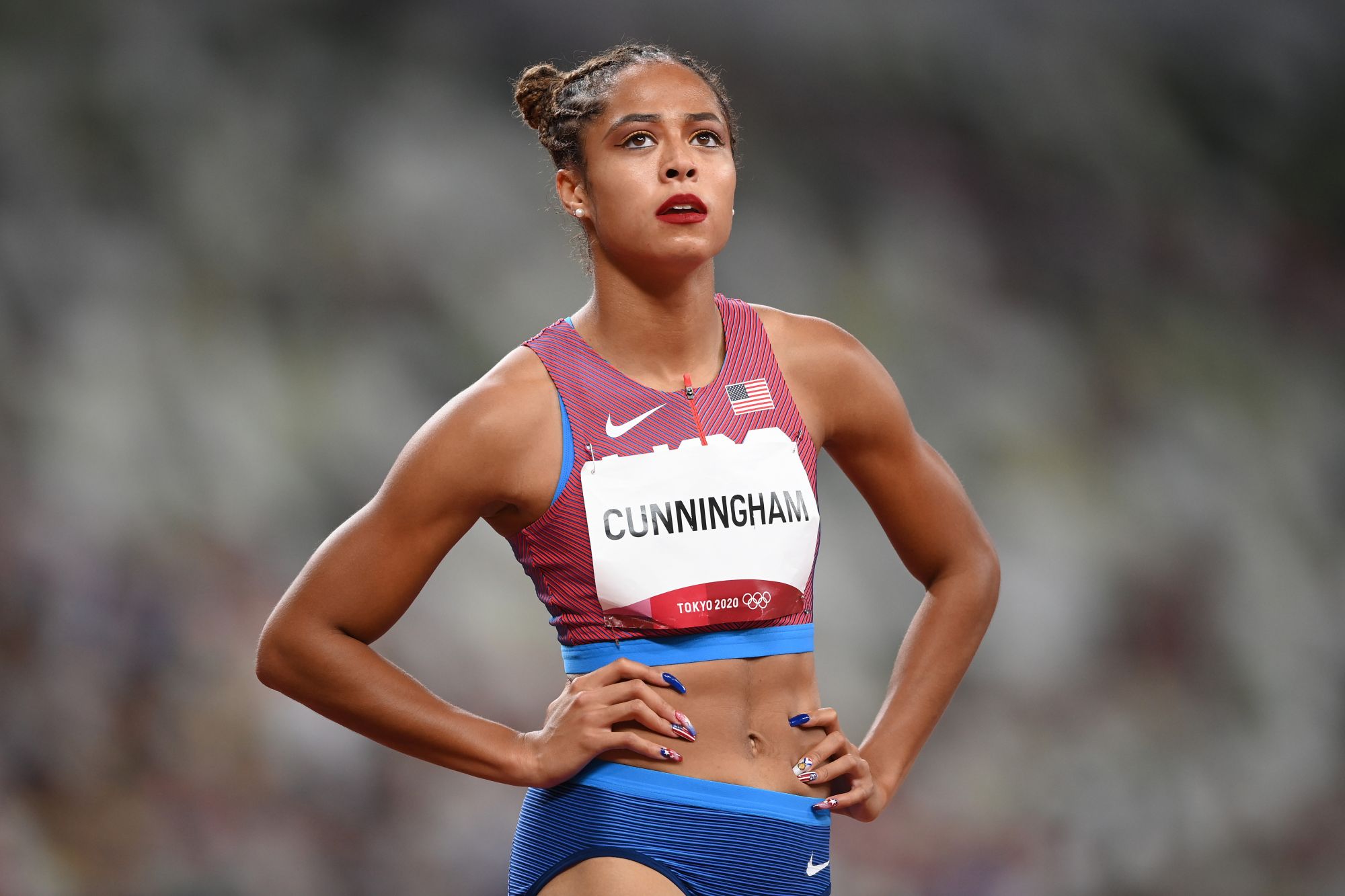 TOKYO, JAPAN - AUGUST 01: Gabriele Cunningham of Team United States reacts after competing in the Women's 100m Hurdles Semi-Final on day nine of the Tokyo 2020 Olympic Games at Olympic Stadium on August 01, 2021 in Tokyo, Japan. (Photo by Matthias Hangst/Getty Images)