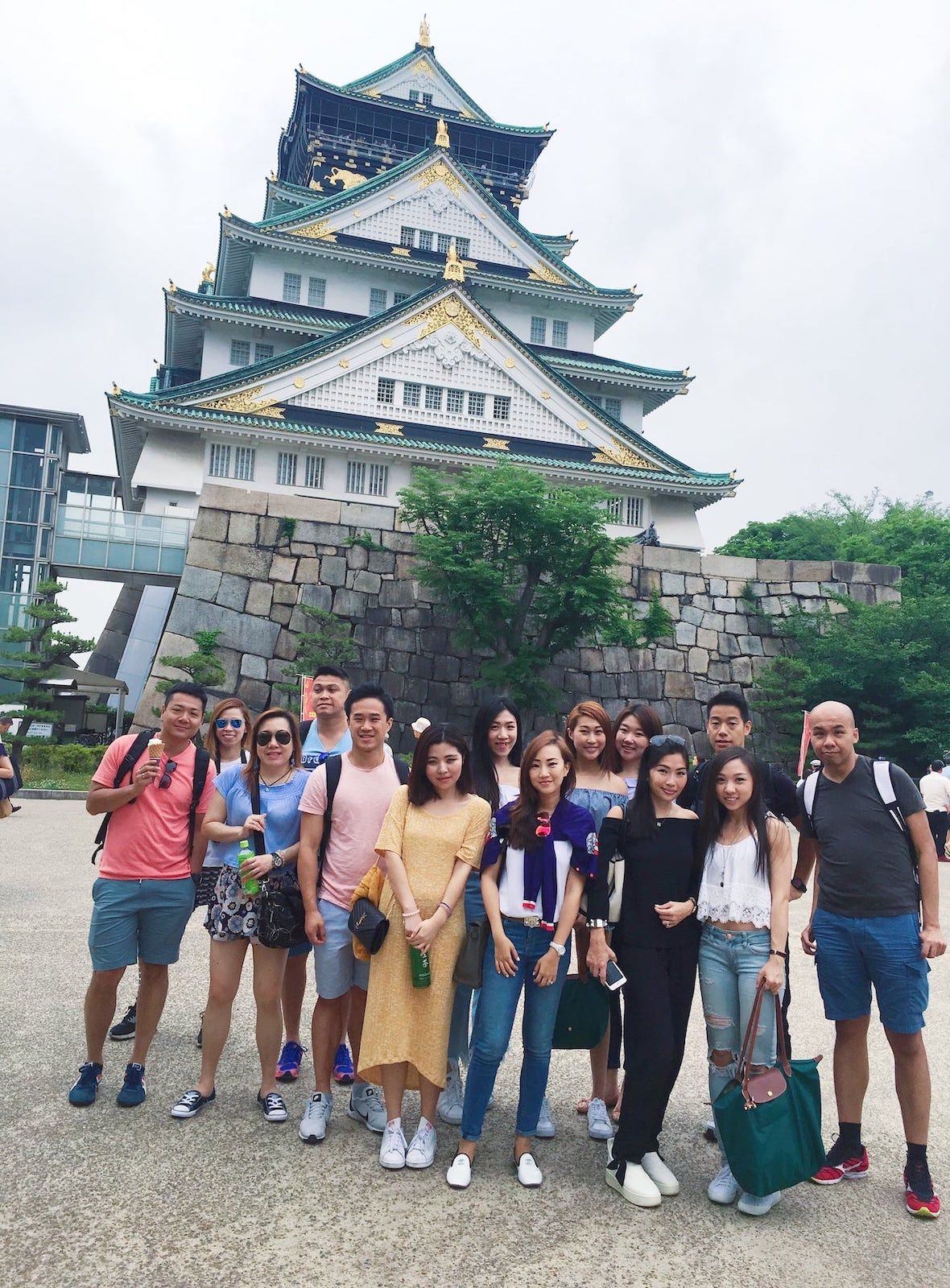 Entrepreneur Charlene Ree with staff from her startup Httpool Asia in Osaka
