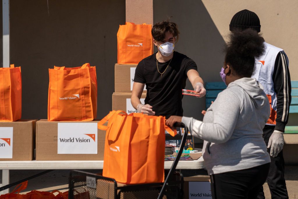 NEW YORK, NY - APRIL 22: Members of World Vision distribute Family Emergency Kits of food and essential supplies at New Hope Community Church to help low-income families during the coronavirus (COVID-19) pandemic on April 22, 2020, in the Staten Island borough of New York City.  World Vision International is an Evangelical Christian humanitarian aid organization.  (Photo by David Dee Delgado/Getty Images)