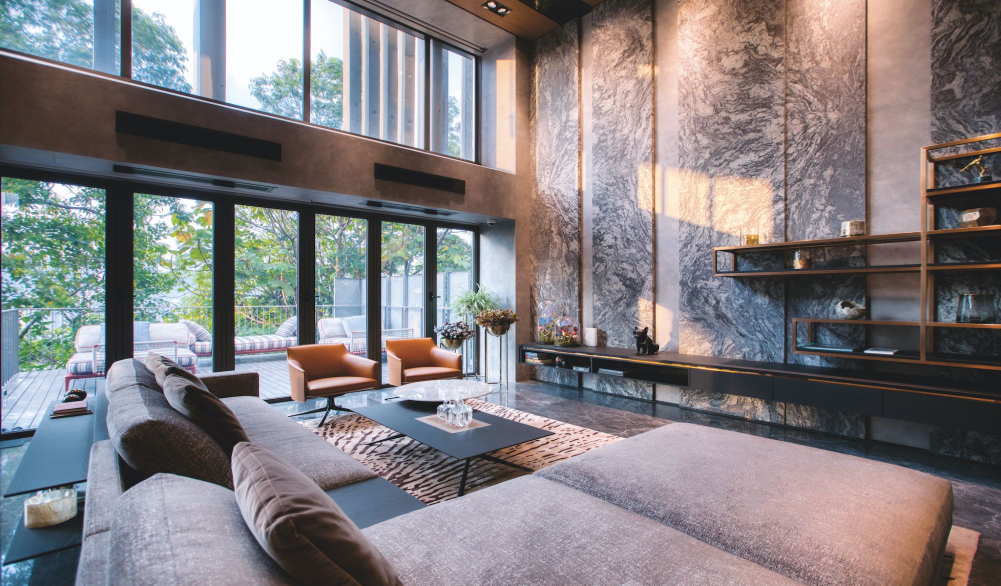 Book matched and honefinished Brazilian marble creates a stunning backdrop for the main entertainment area