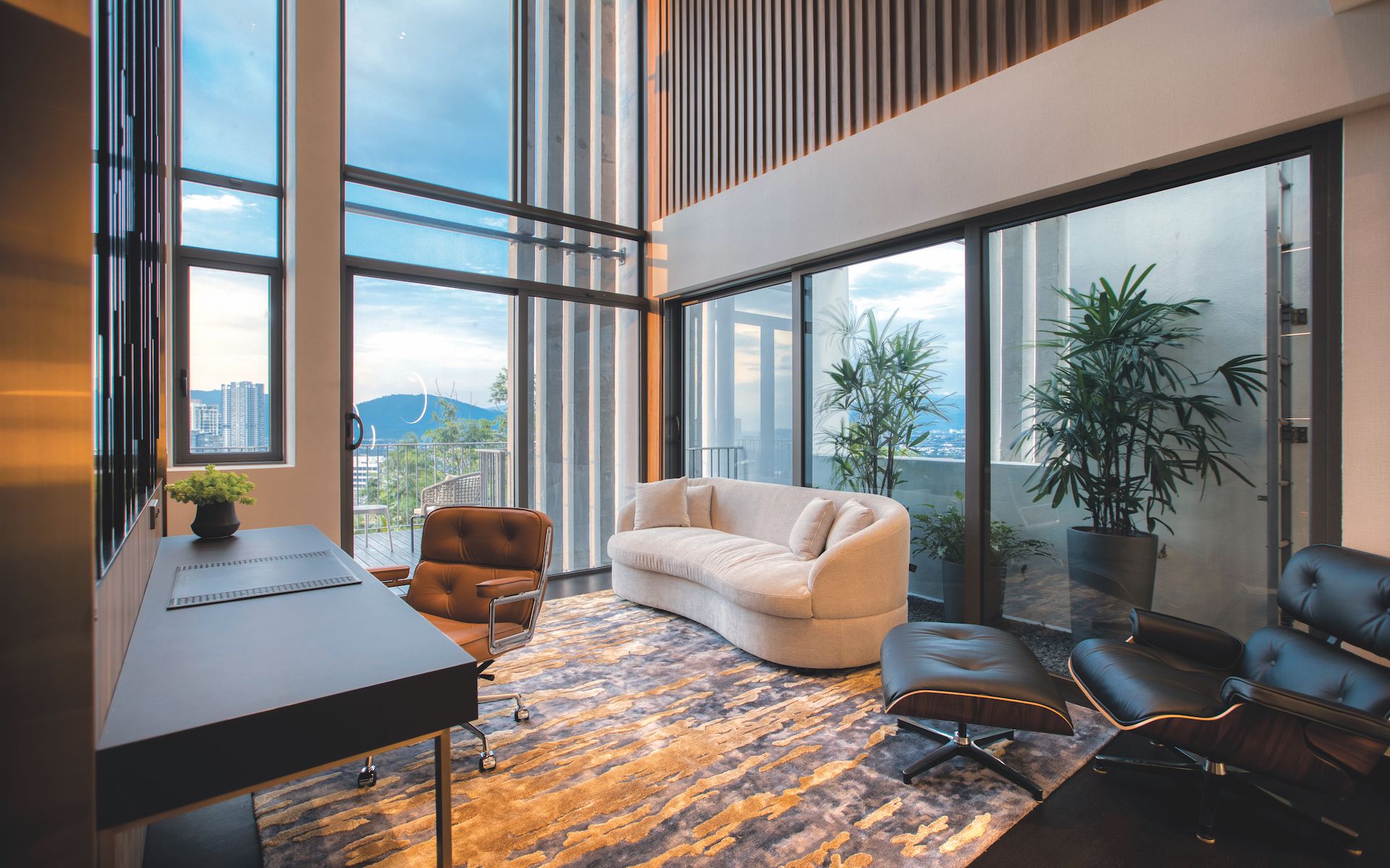 On the top floor, the study offers the client a quiet space that’s a respite from hectic family life