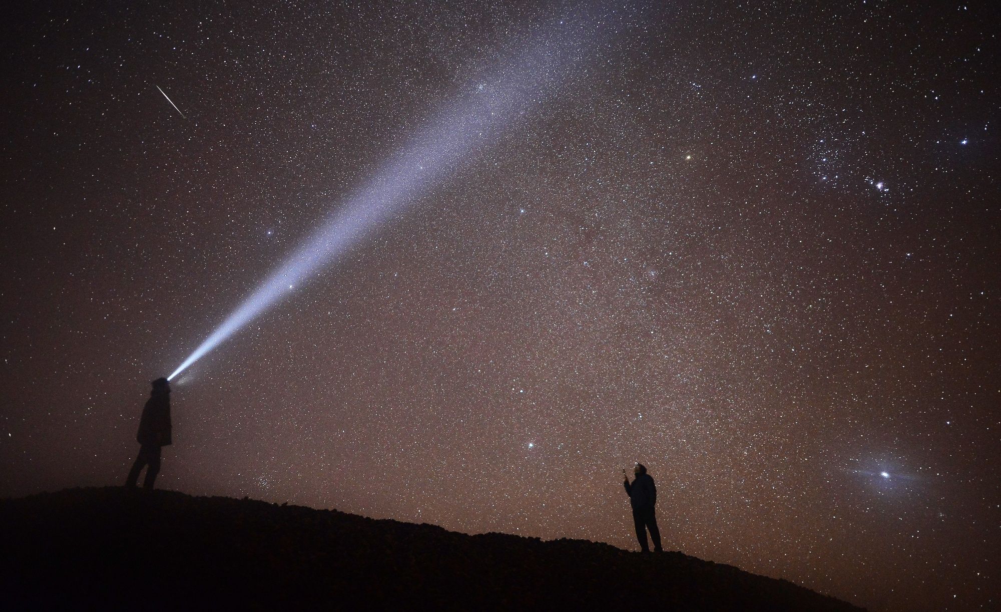 USAK, TURKEY - DECEMBER 13: Meteors named as 'Geminid' streak across the sky over Turkey's Usak on December 13, 2017. (Photo by Soner Kilinc/Anadolu Agency/Getty Images)
