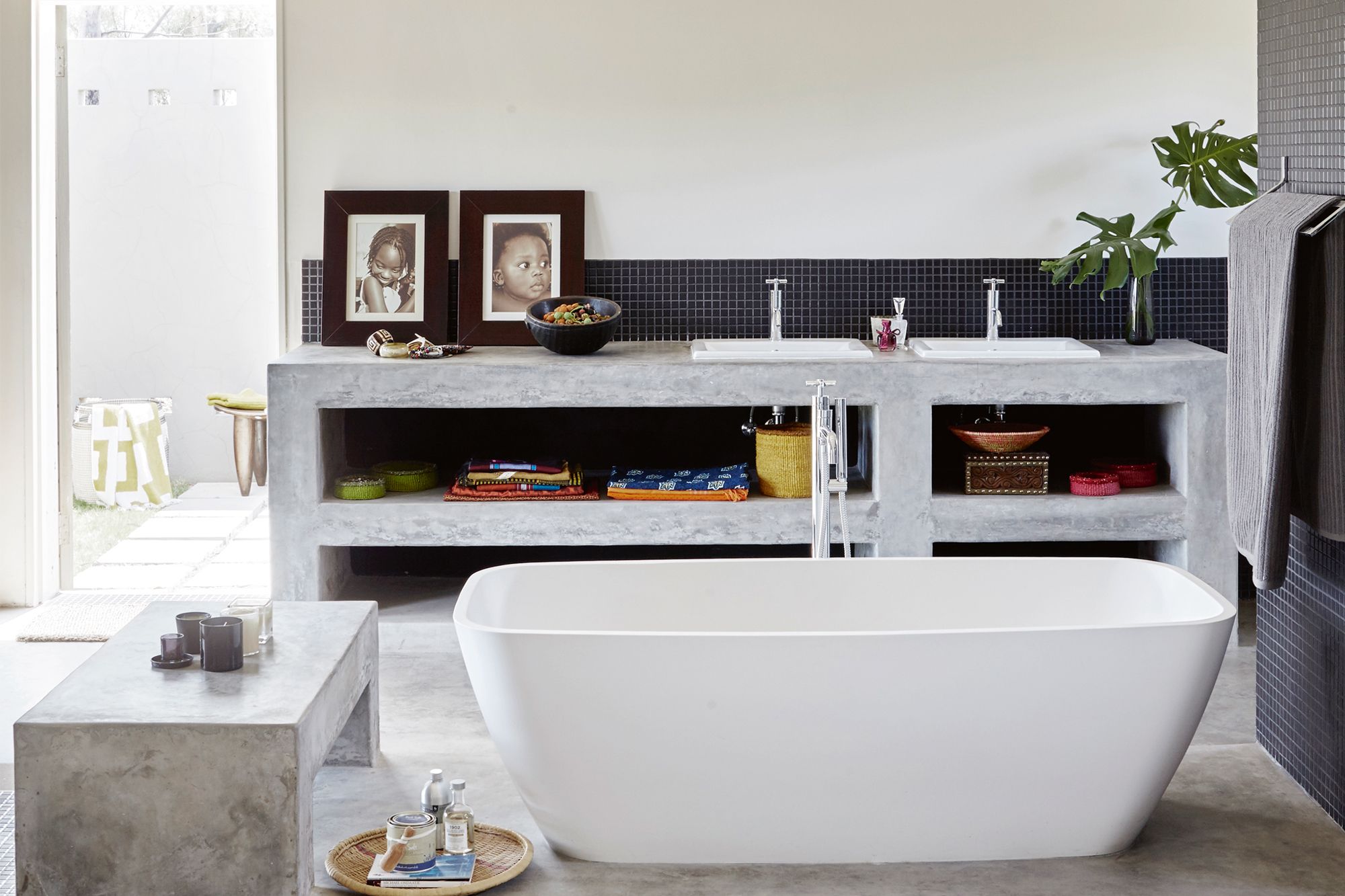 Use stone and natural grey tones to create a modern chic space