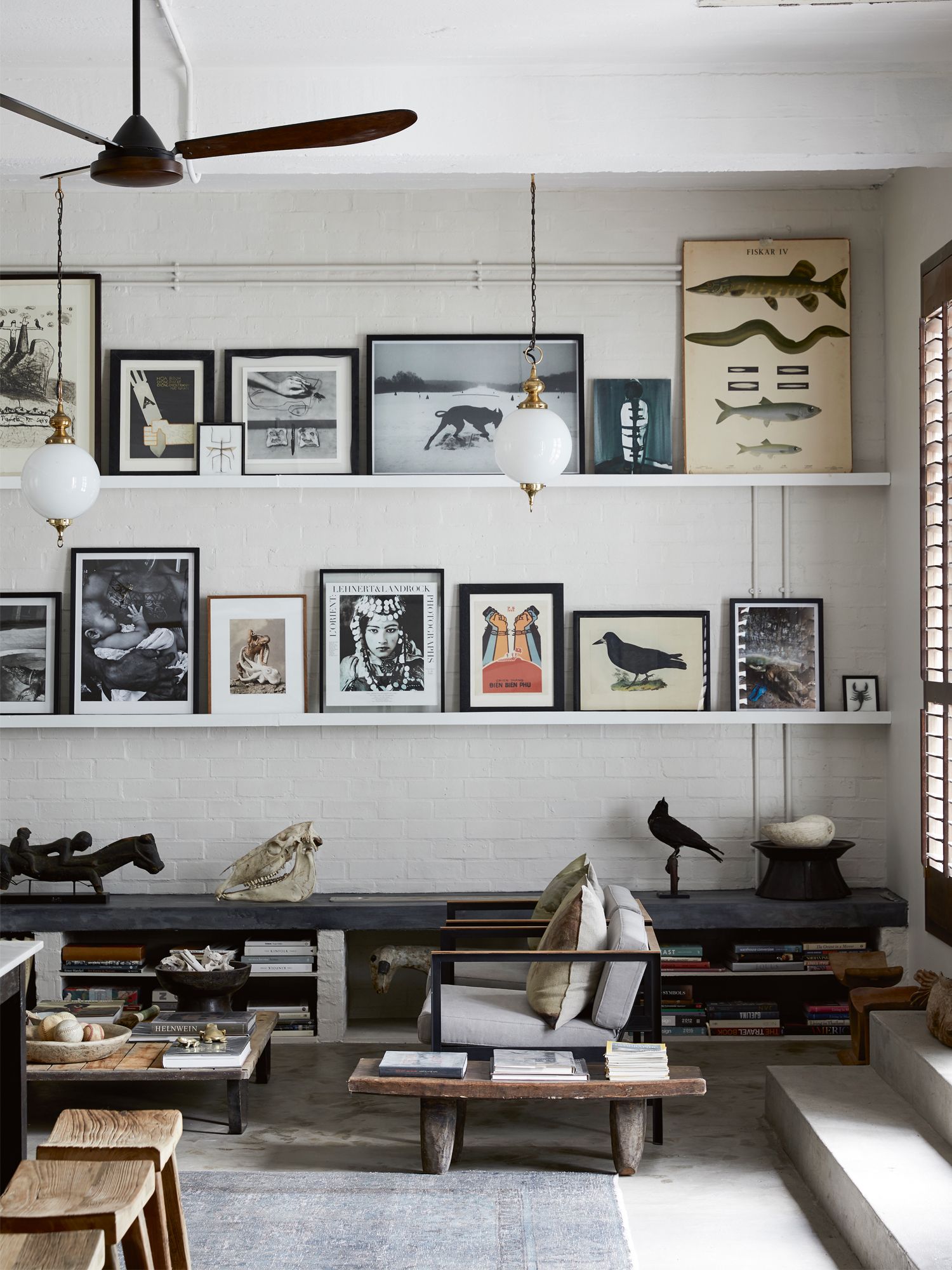 Low-slung furniture ensures that your art remains the focus of the room