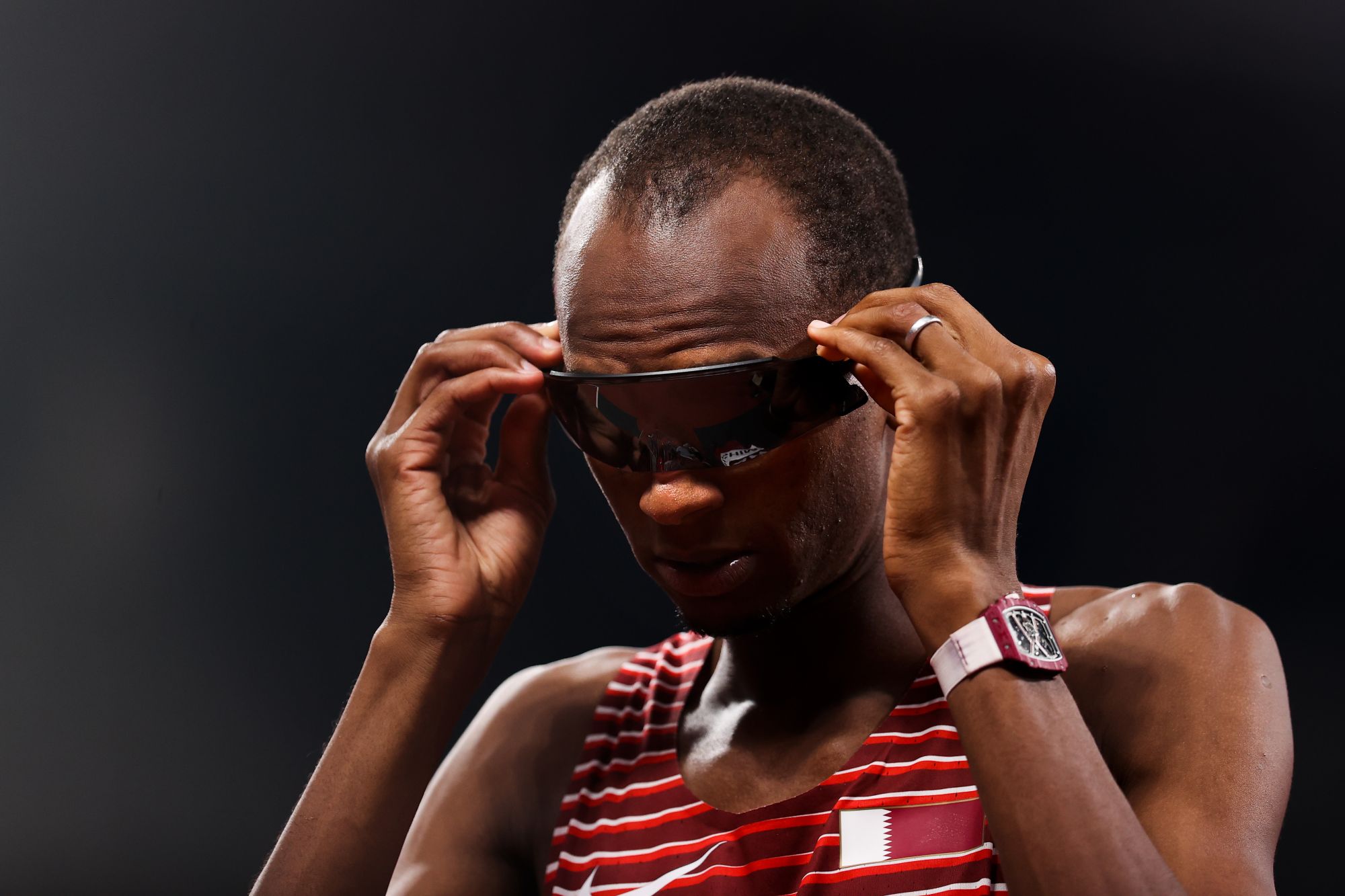 TOKYO, JAPAN - AUGUST 01: Mutaz Essa Barshim of Team Qatar looks on during the Men's High Jump Final on day nine of the Tokyo 2020 Olympic Games at Olympic Stadium on August 01, 2021 in Tokyo, Japan. (Photo by David Ramos/Getty Images)