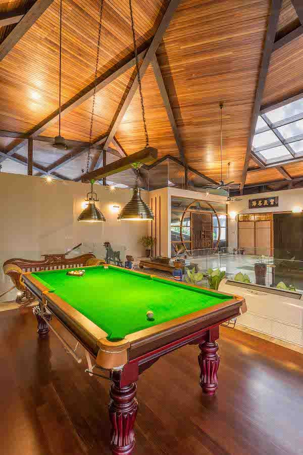 Nature is the main focus of the construction, which informs its use of natural material such as timber and stones throughout the space